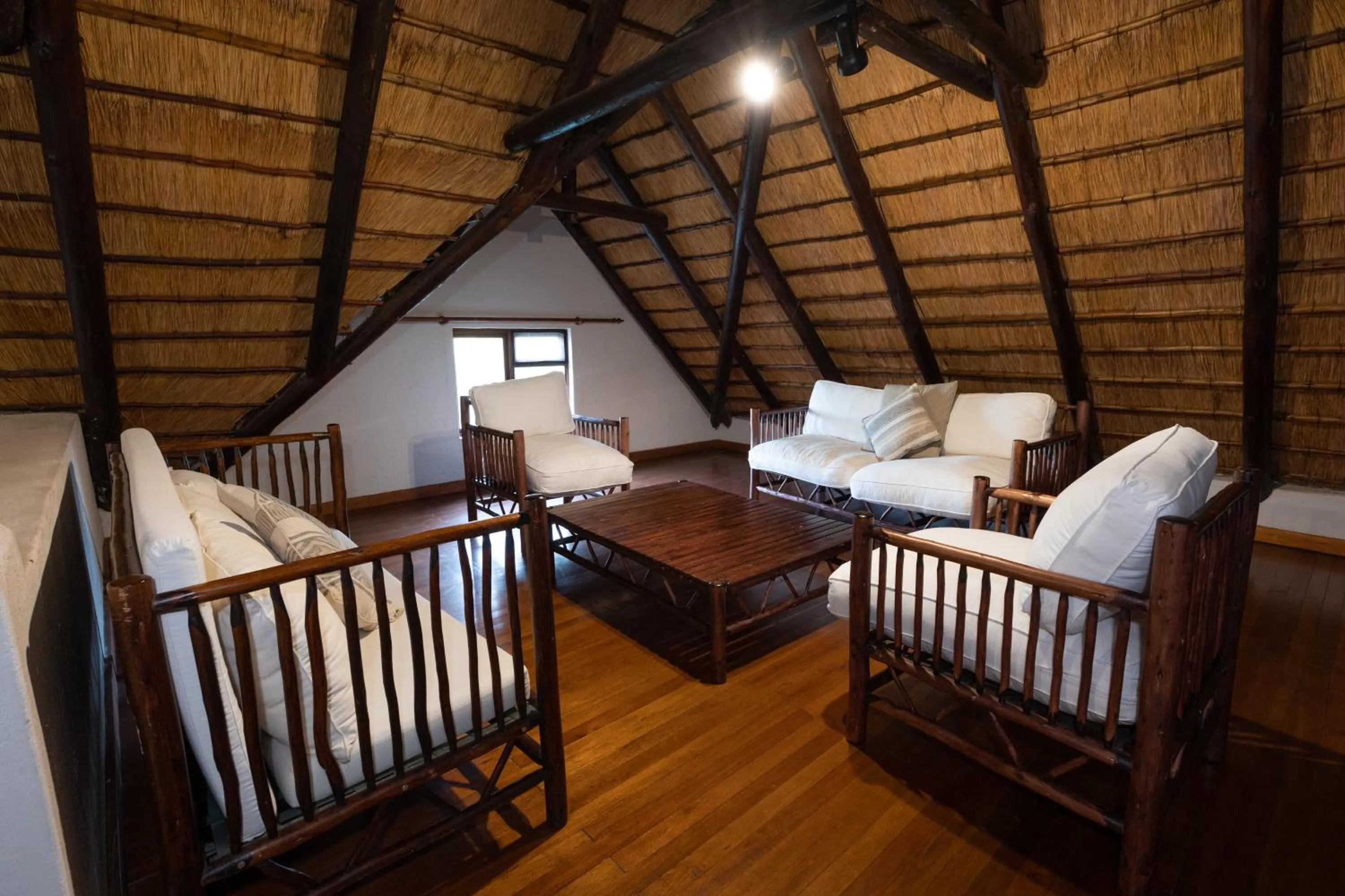 Living room, Bed in Nyati Safari Lodge