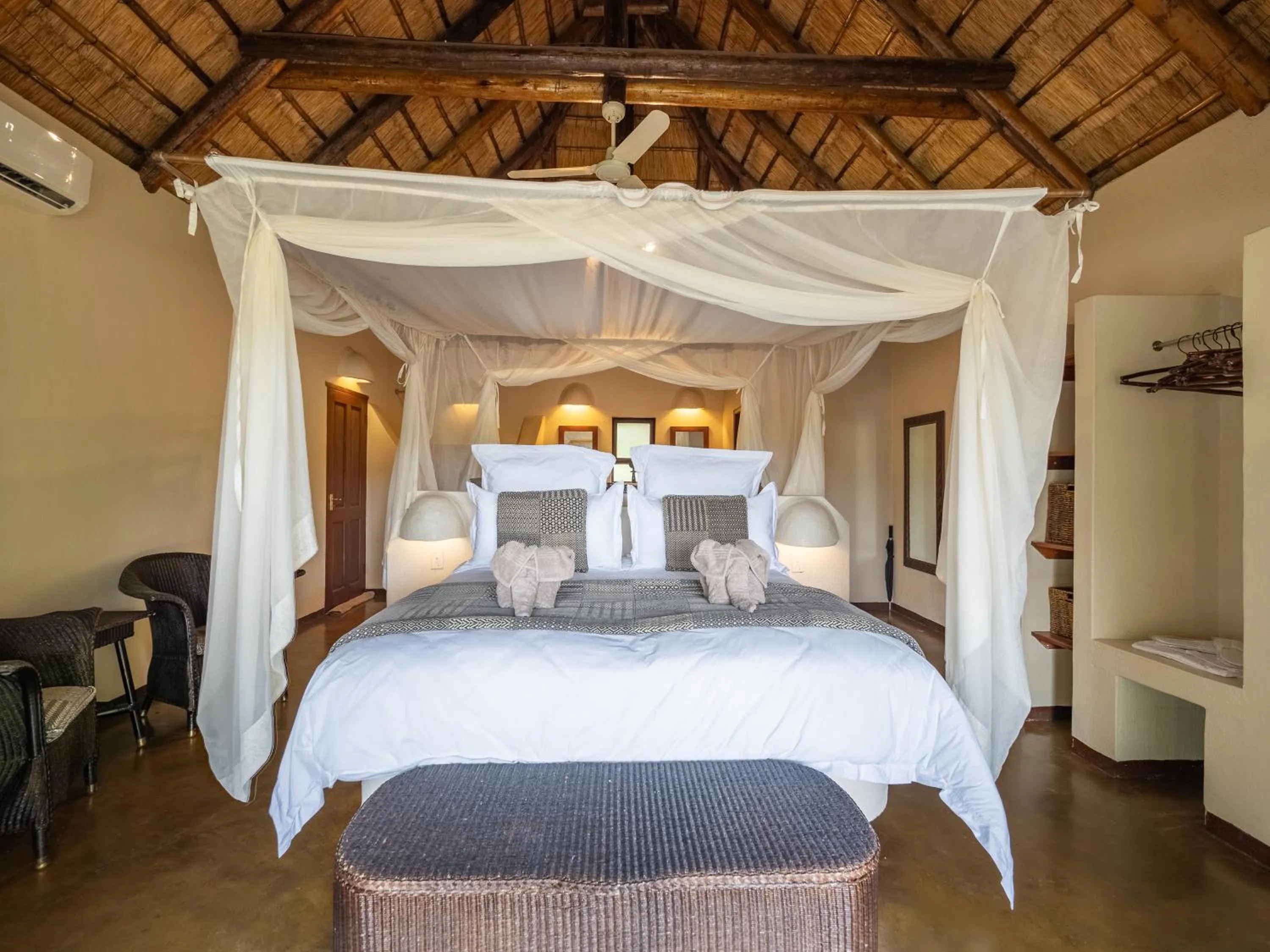 Bed in Nyati Safari Lodge