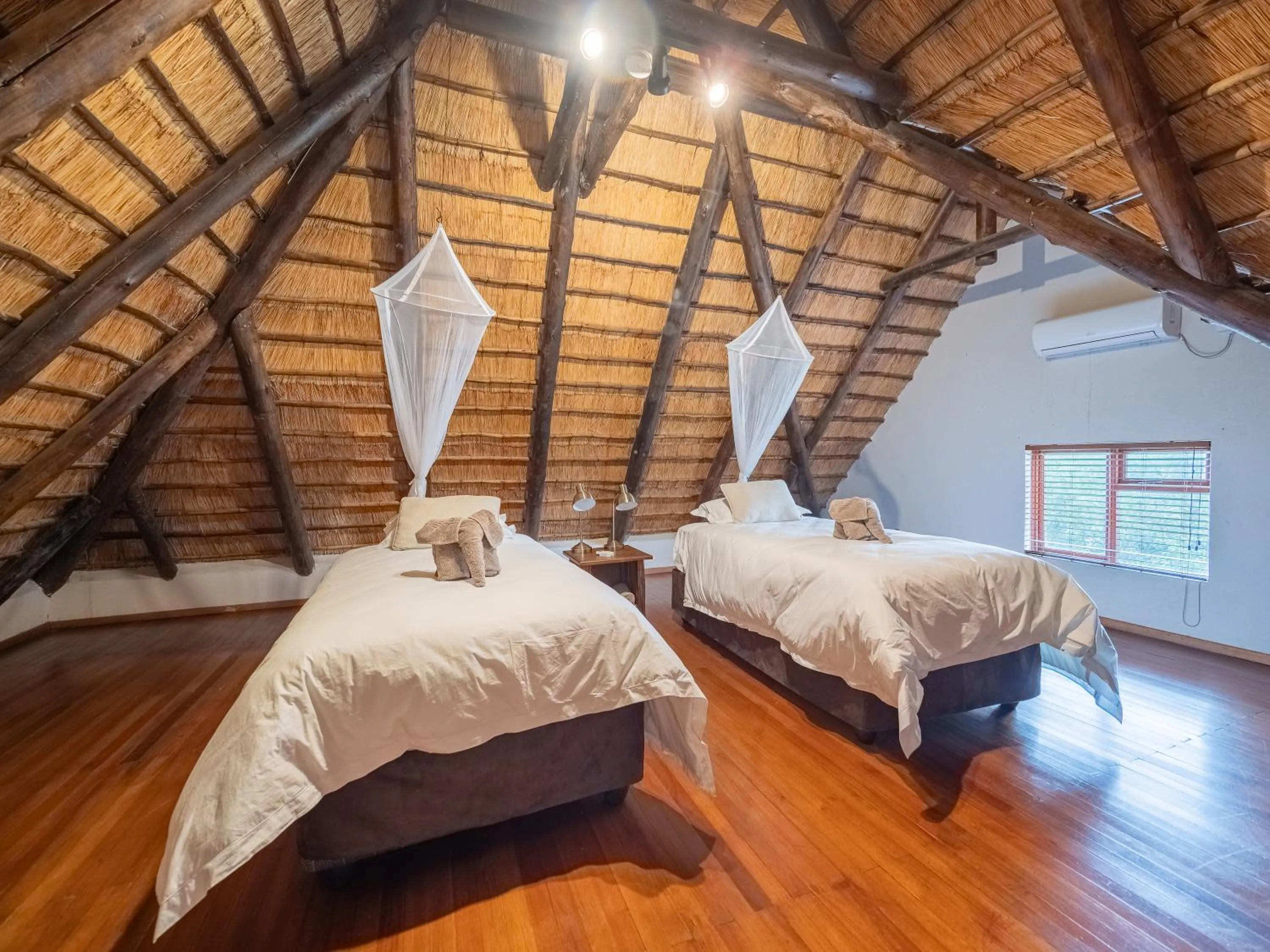 Property building, Bed in Nyati Safari Lodge