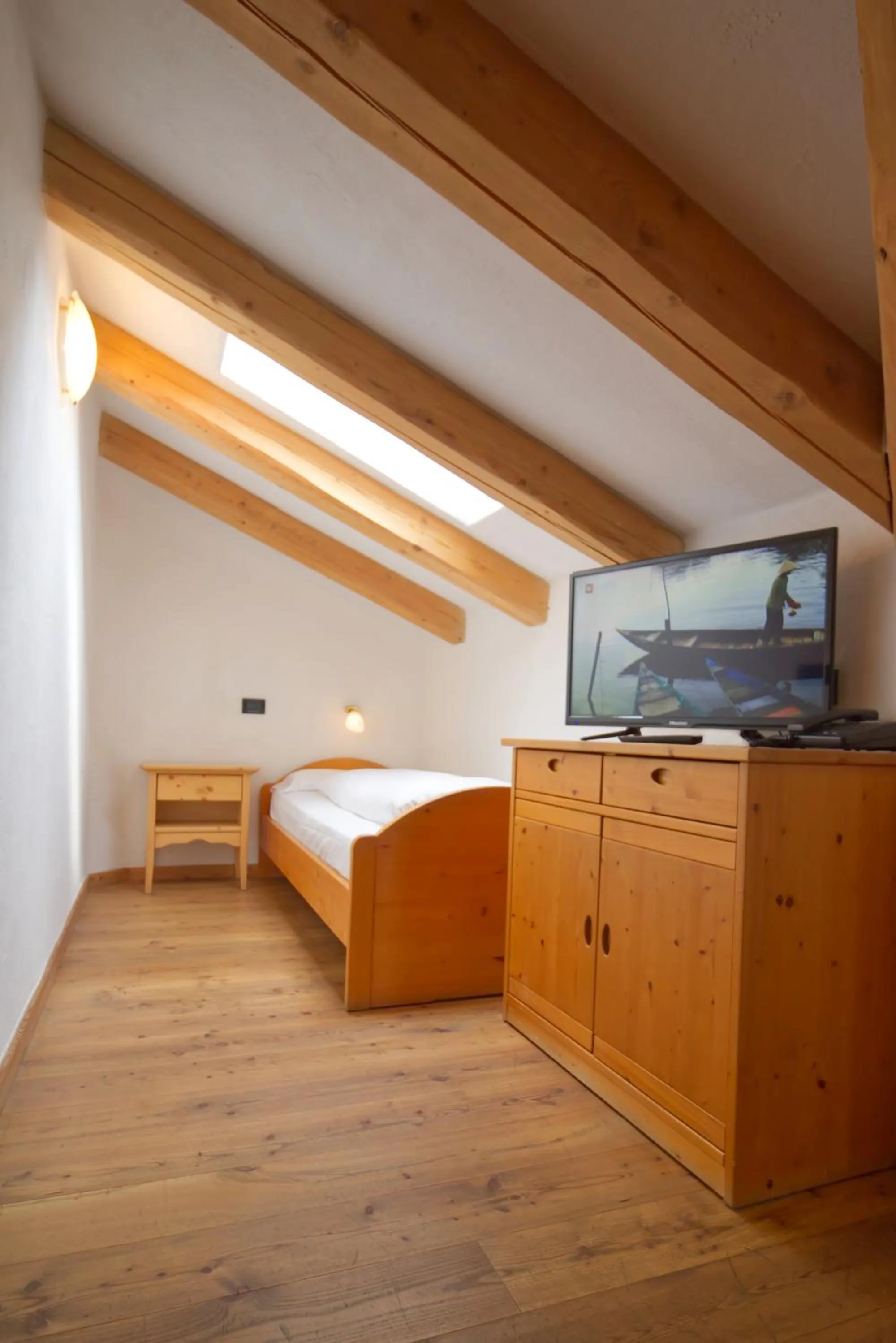 Photo of the whole room, Bed in Residence Miramonti