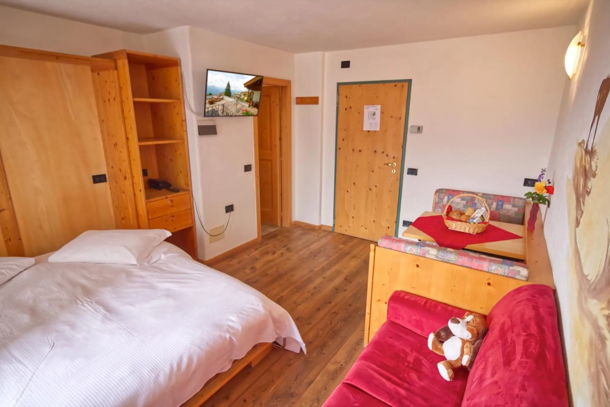 Photo of the whole room, Bed in Residence Miramonti