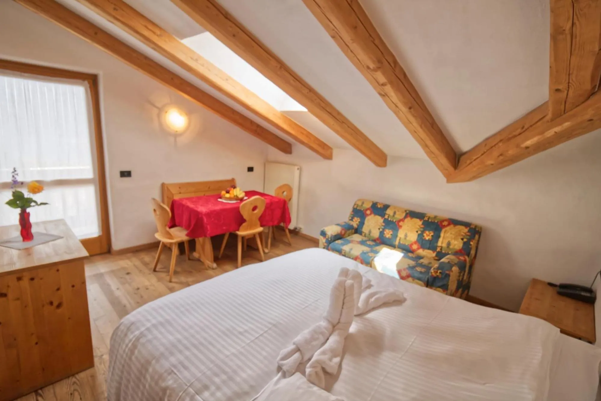 Photo of the whole room, Bed in Residence Miramonti