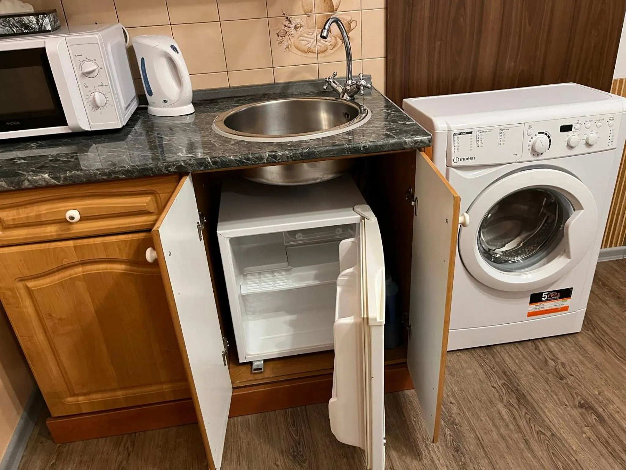 Kitchen or kitchenette in Mila Apartments