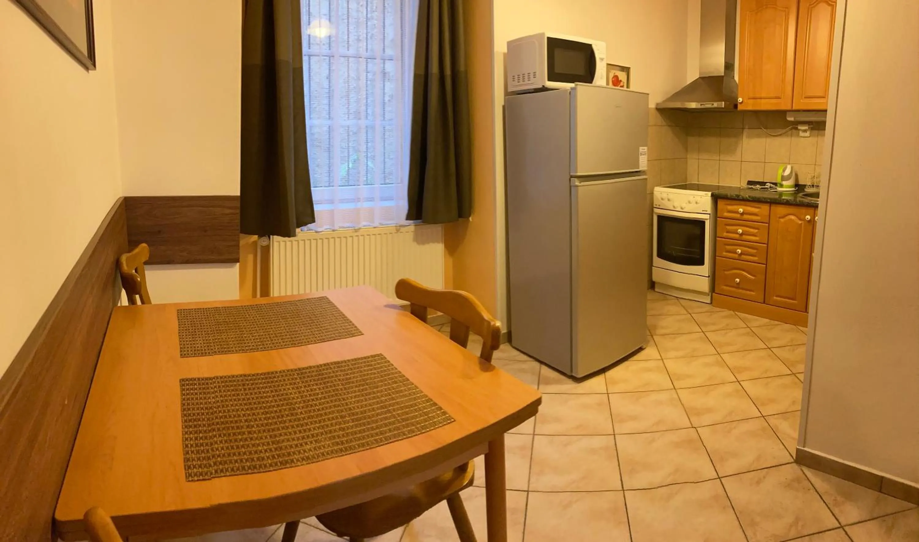 Kitchen or kitchenette in Mila Apartments