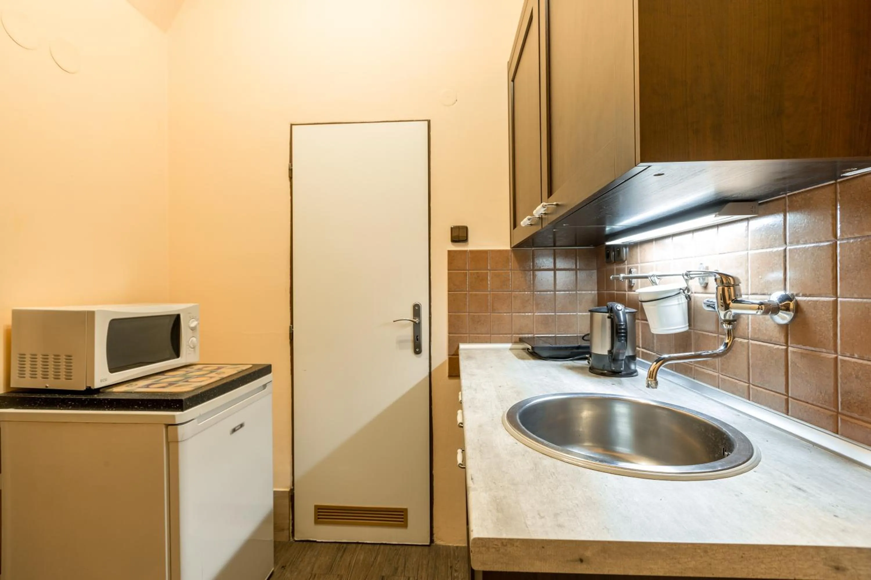 Kitchen or kitchenette in Mila Apartments