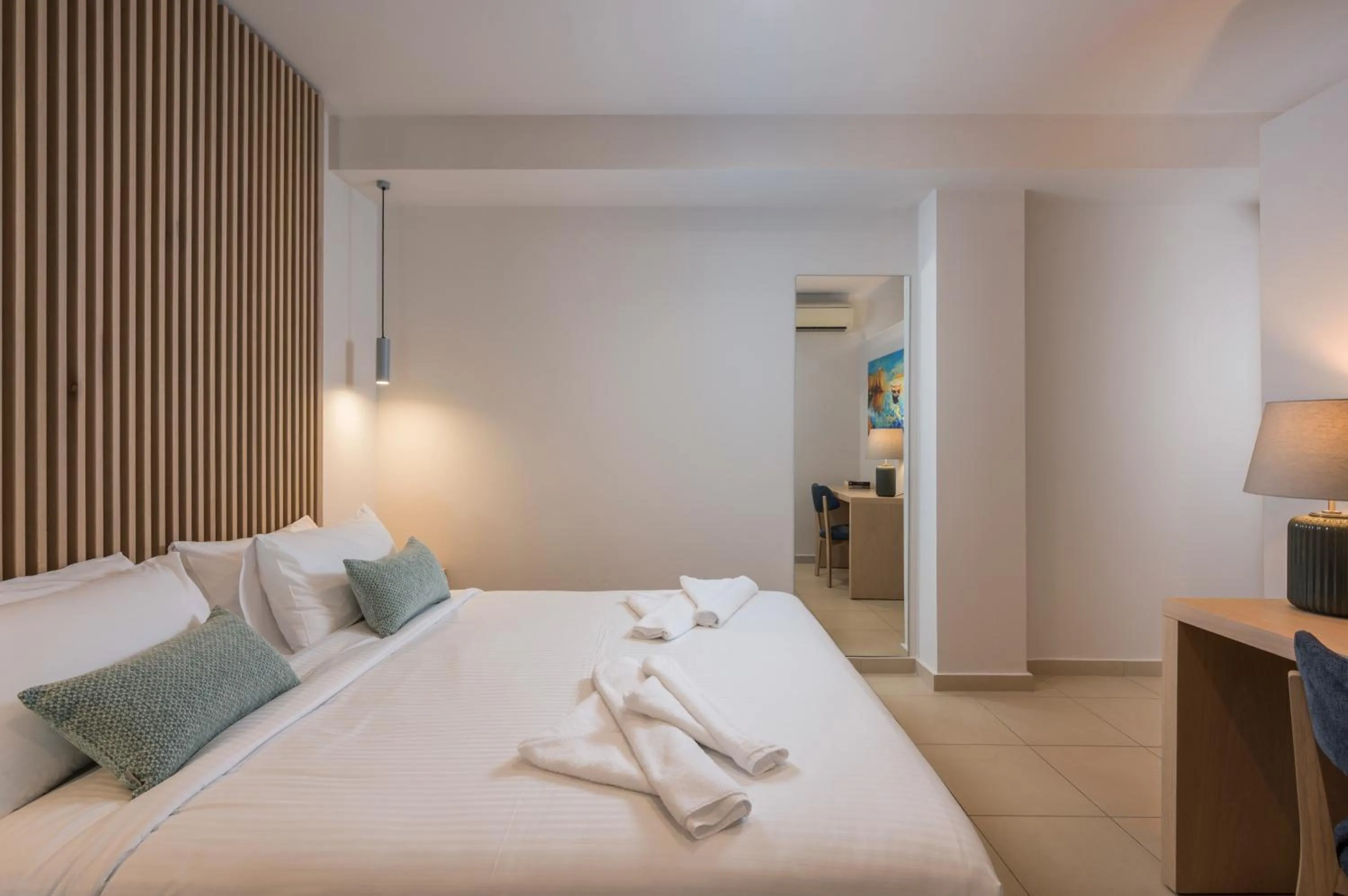 Bed in Trianon Luxury Apartments & Suites