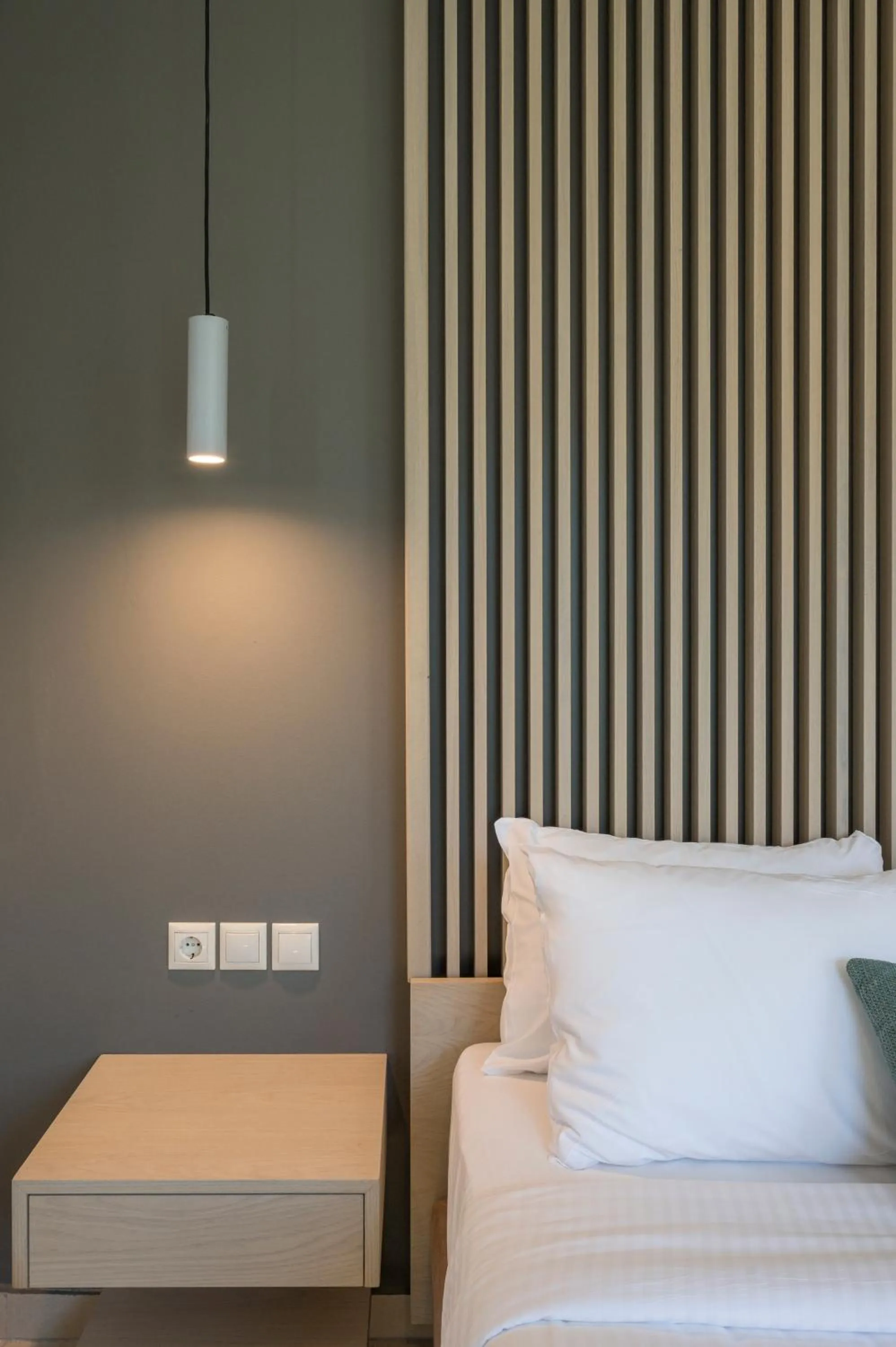 Bed in Trianon Luxury Apartments & Suites