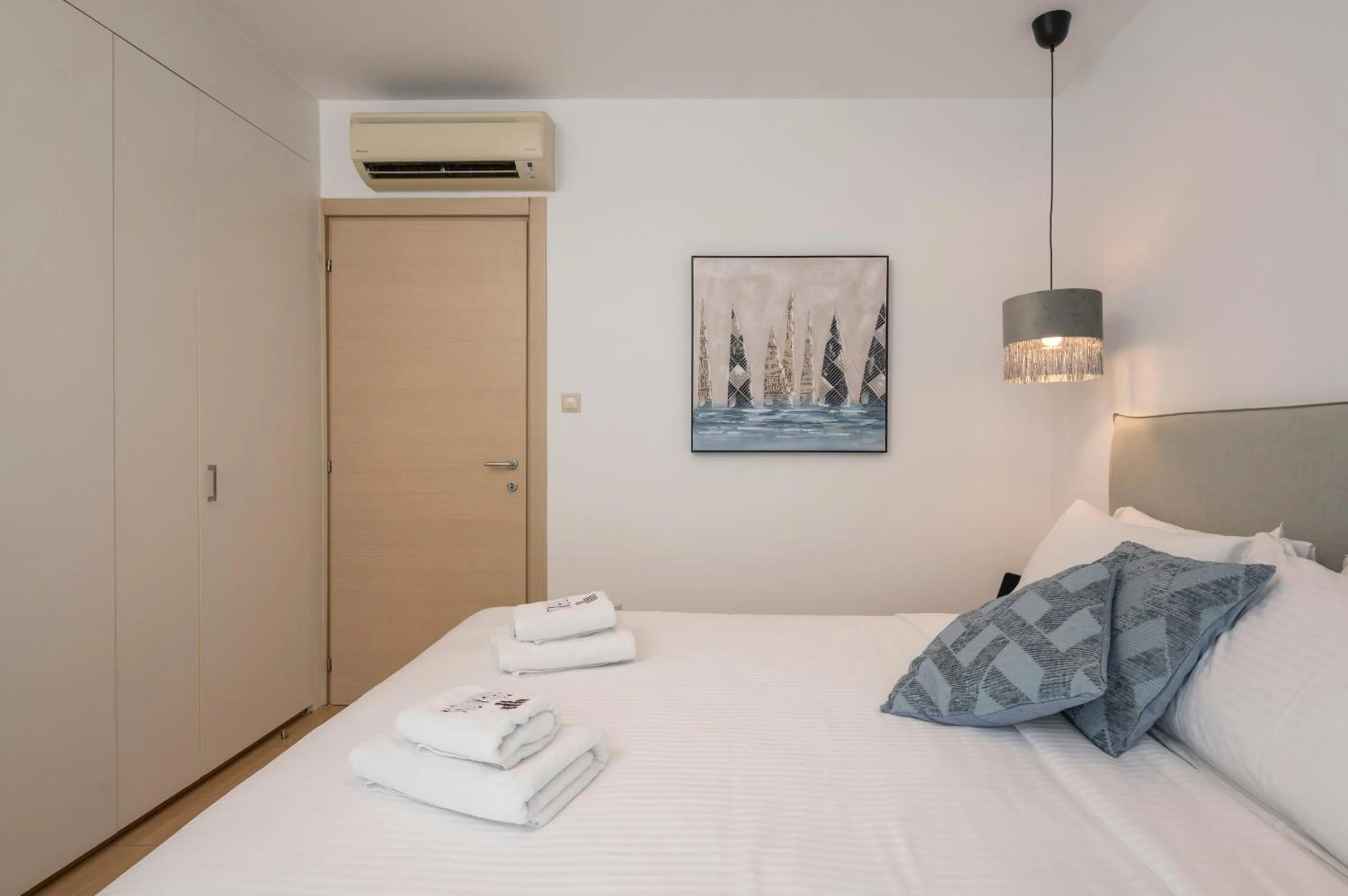 Bed in Trianon Luxury Apartments & Suites