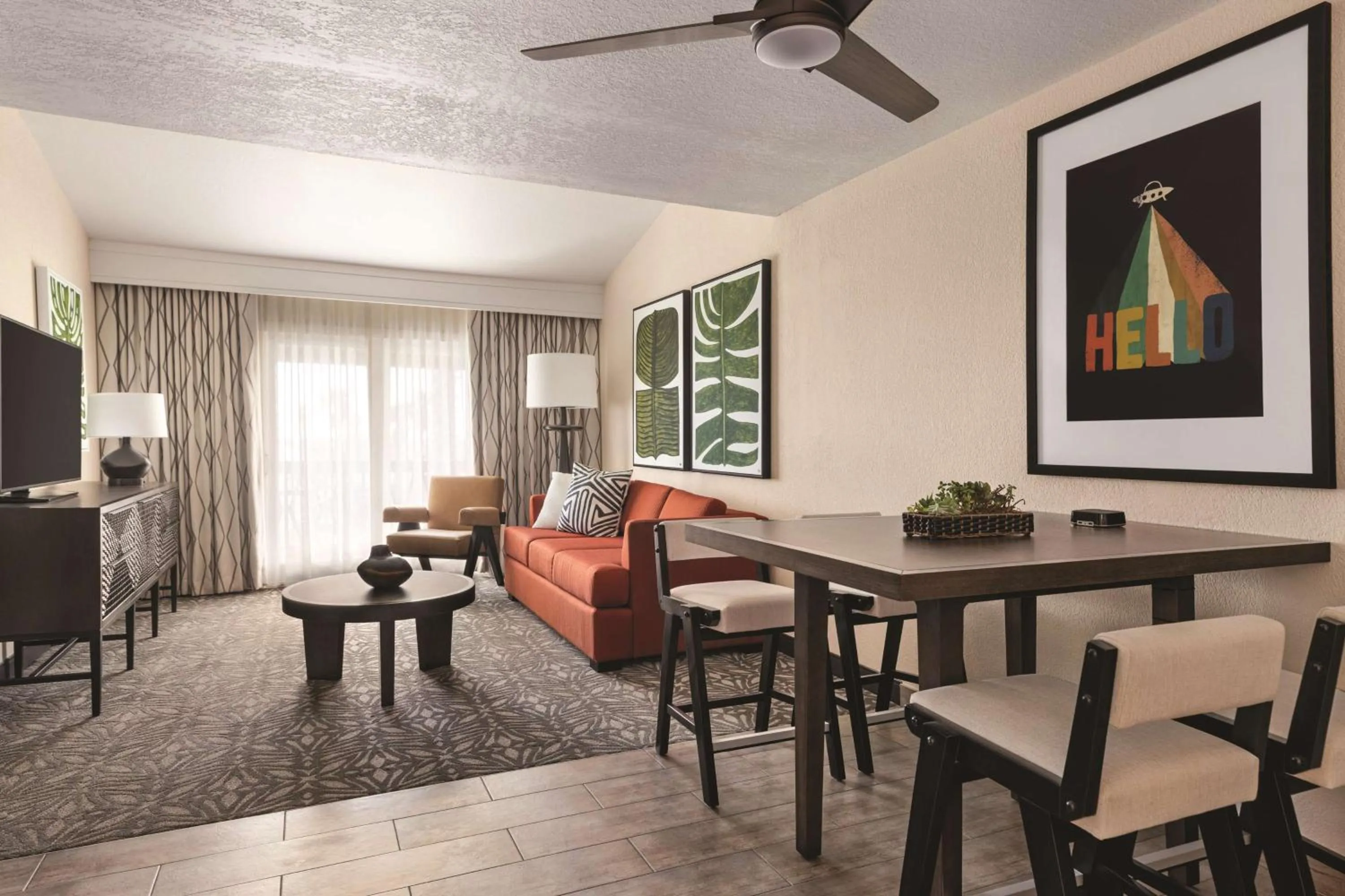 Living room in Zachari Dunes on Mandalay Beach, Curio Collection by Hilton