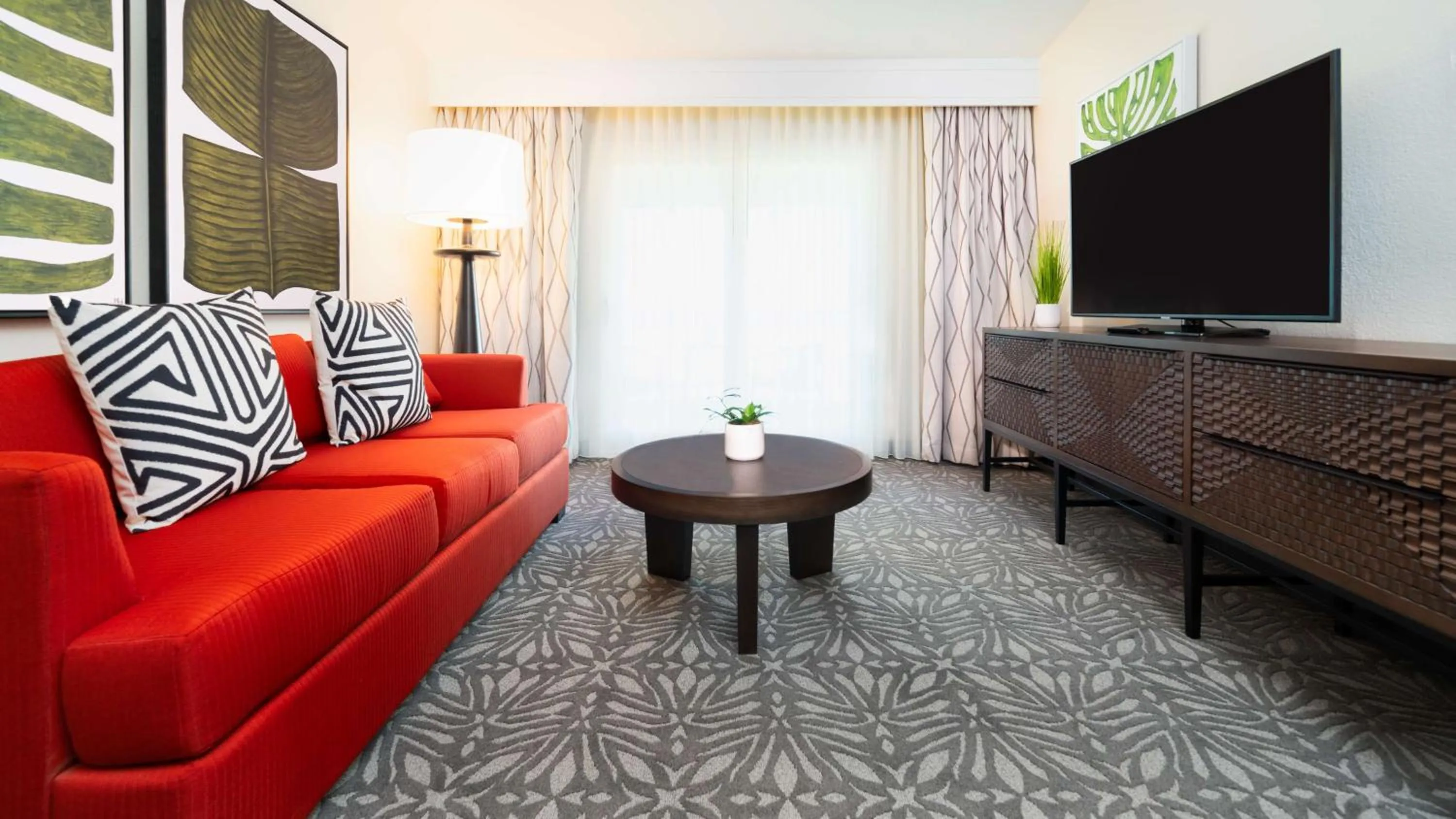 Living room in Zachari Dunes on Mandalay Beach, Curio Collection by Hilton