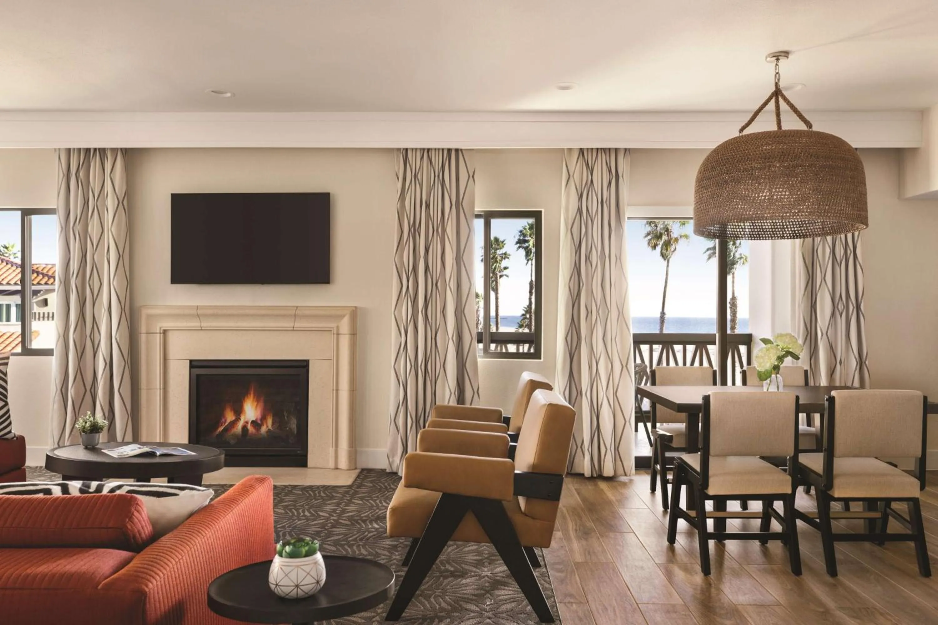 Living room in Zachari Dunes on Mandalay Beach, Curio Collection by Hilton