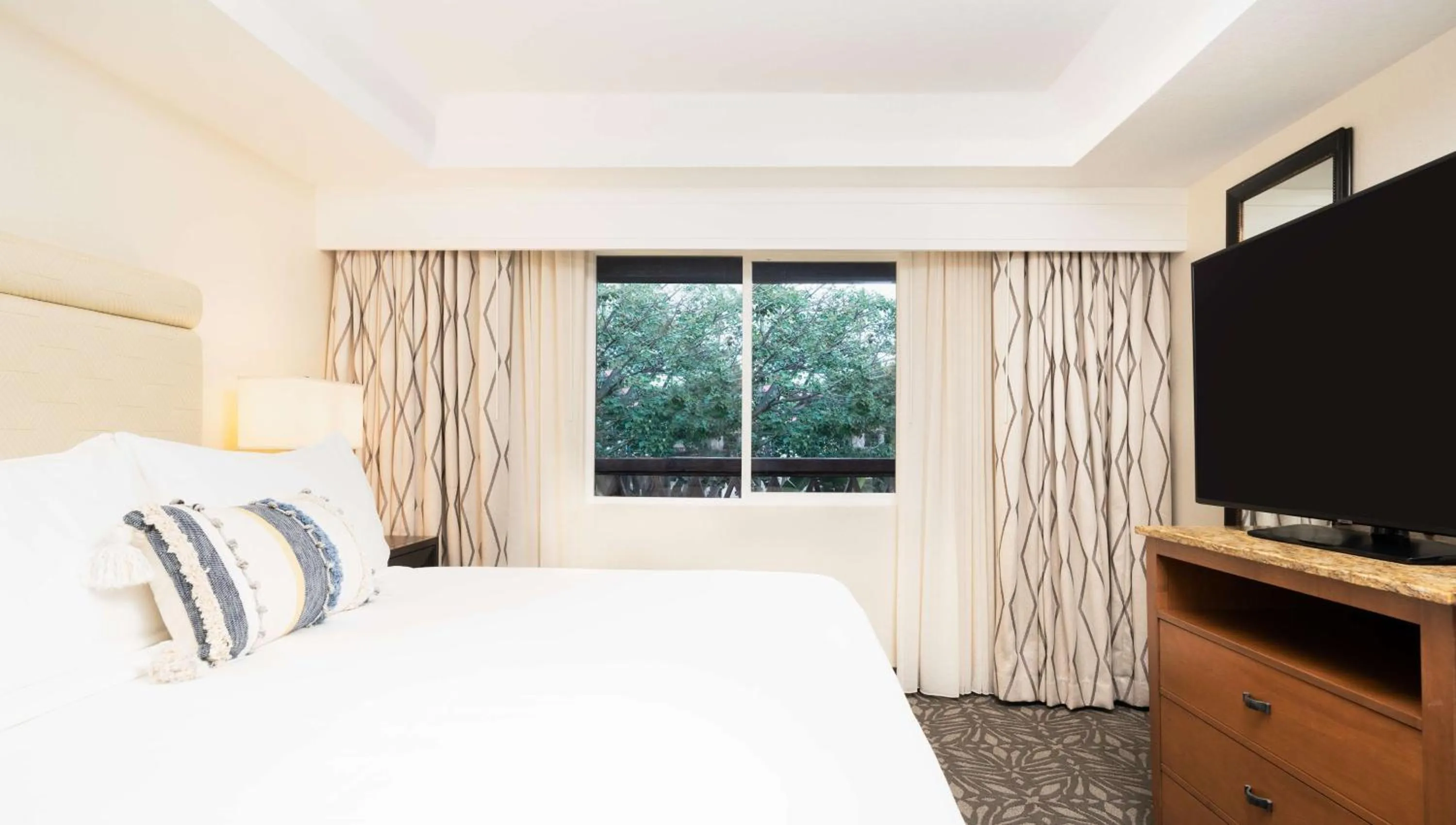 Bed in Zachari Dunes on Mandalay Beach, Curio Collection by Hilton