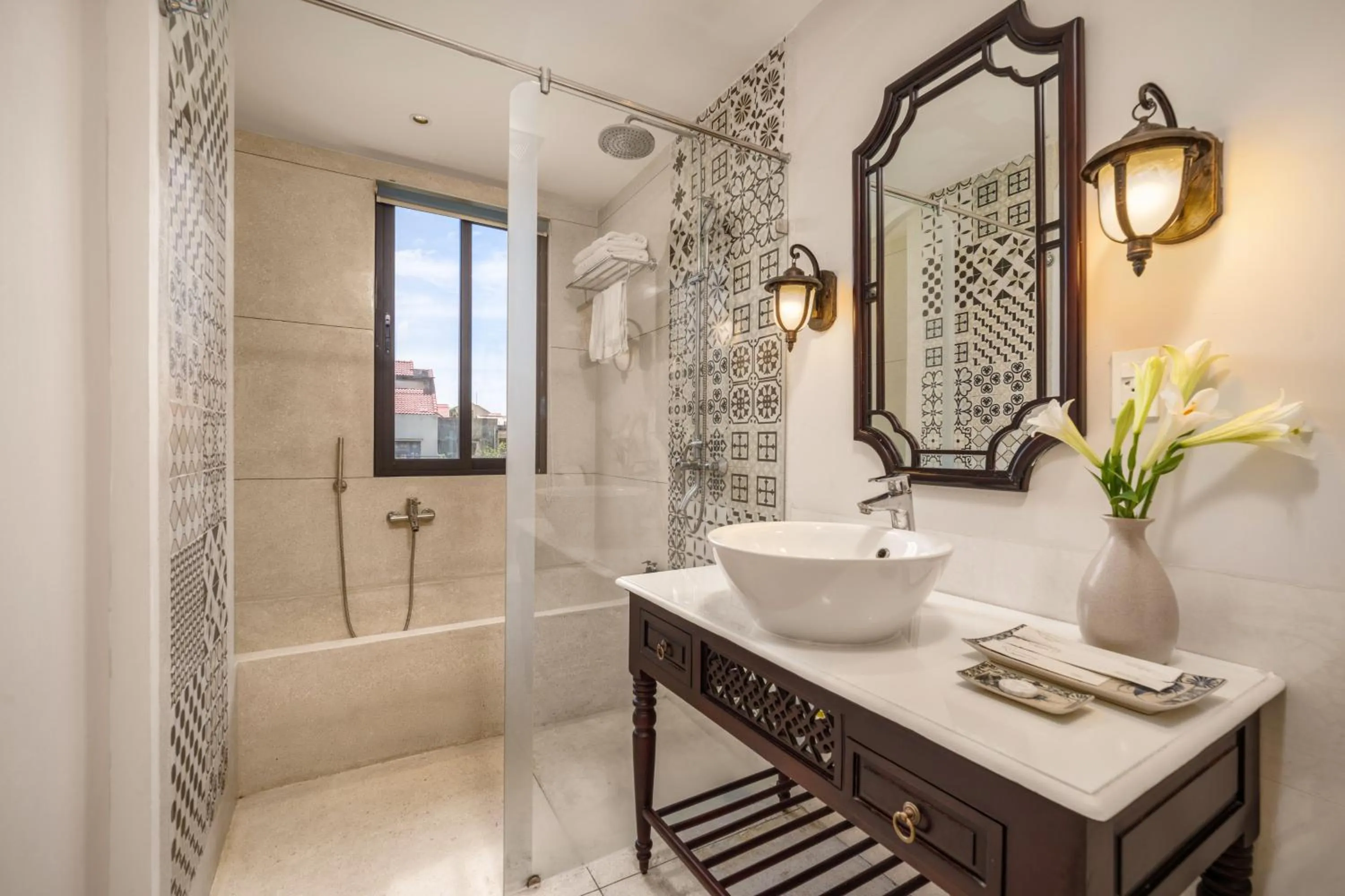 Shower in Hoi An Rosemary Boutique Hotel & Spa - A Peaceful Retreat