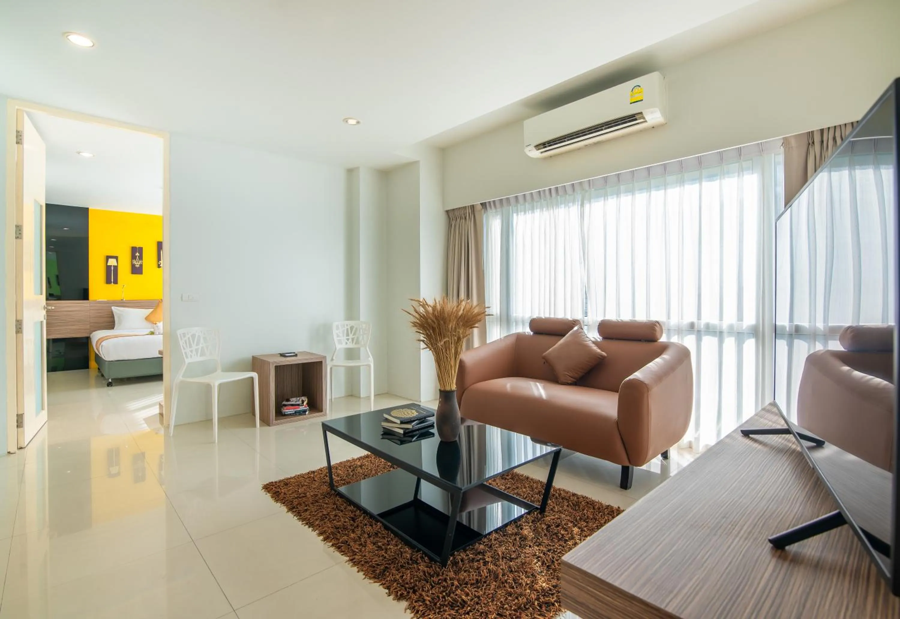 Living room in The Lantern Resorts Patong - SHA Extra Plus