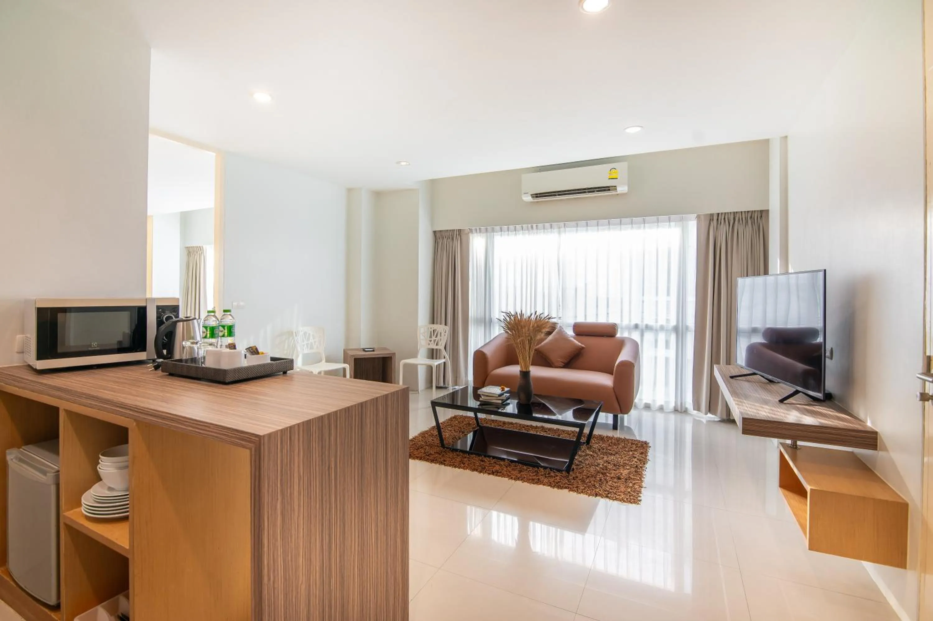 Living room in The Lantern Resorts Patong - SHA Extra Plus