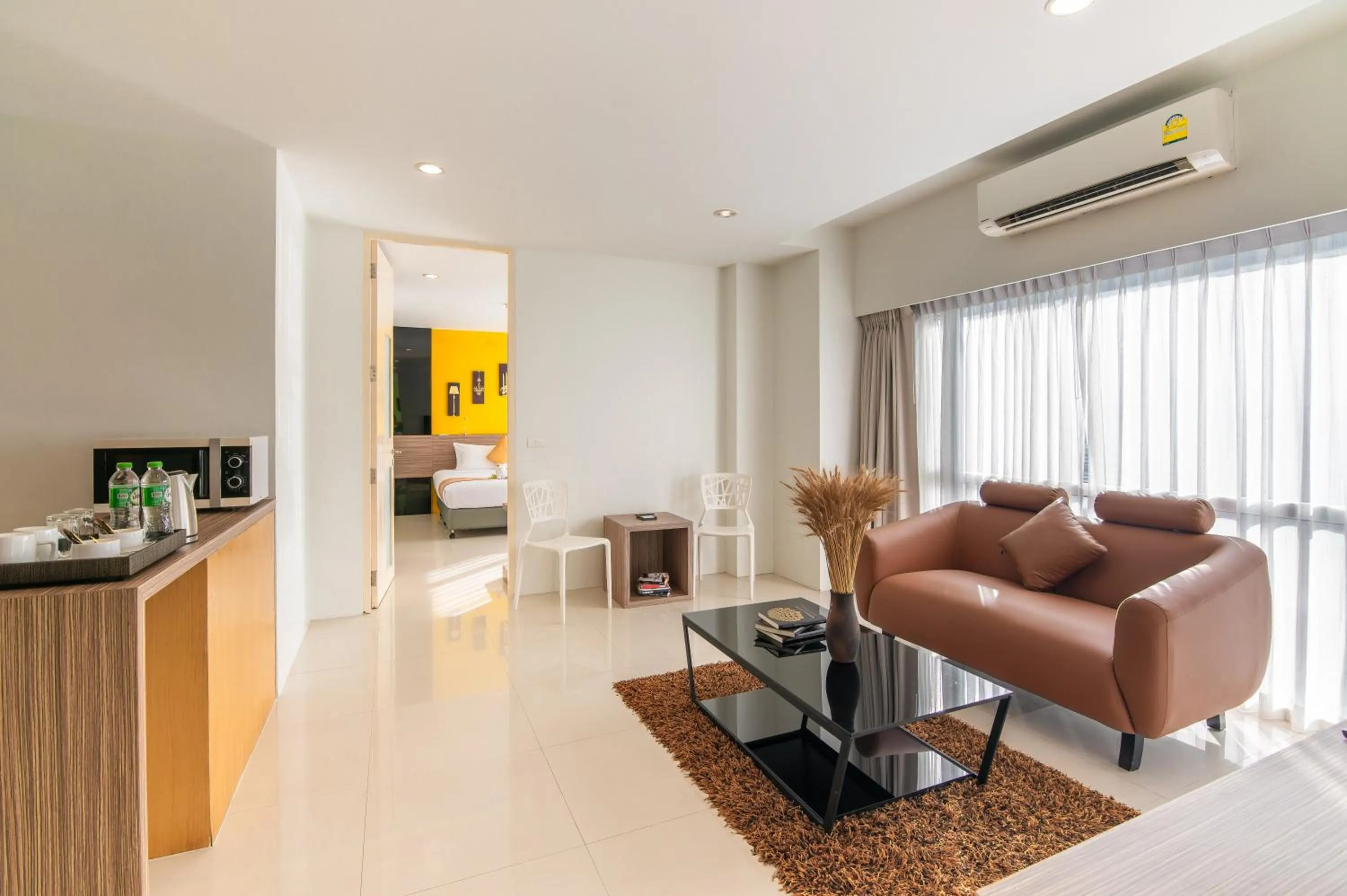 Living room in The Lantern Resorts Patong - SHA Extra Plus