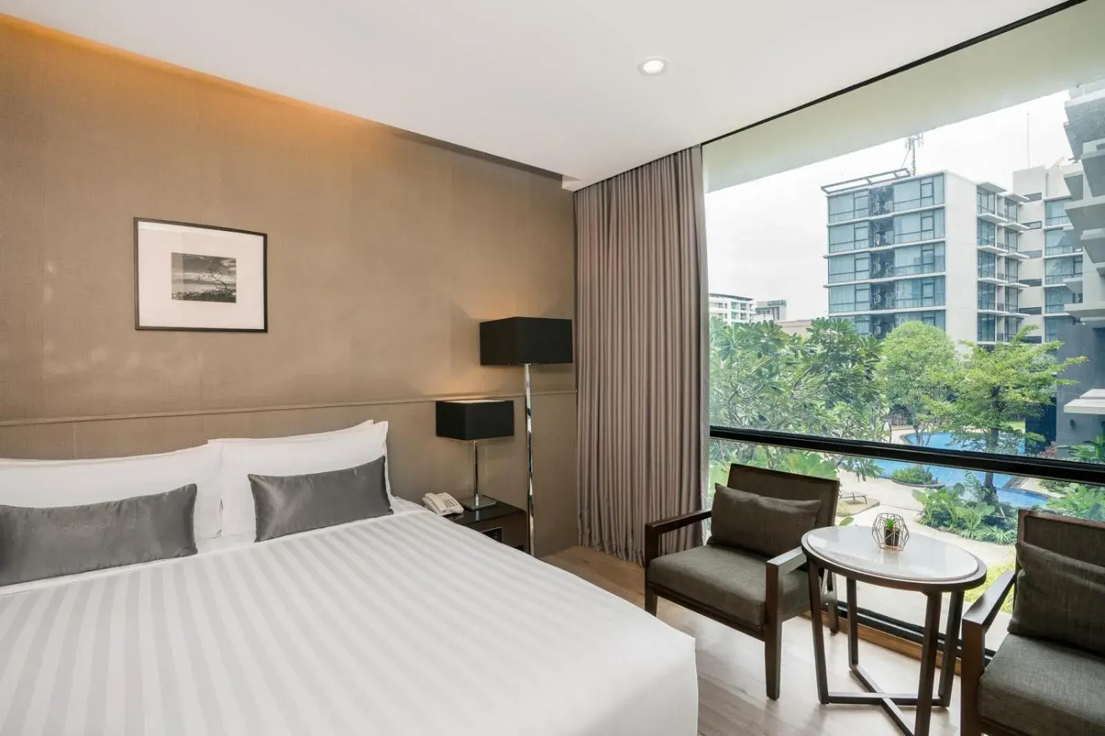 Deluxe Double Room with Pool View in Altera Hotel and Residence by At Mind Deluxe Double Room with Pool View in Altera Hotel and Residence by At Mind