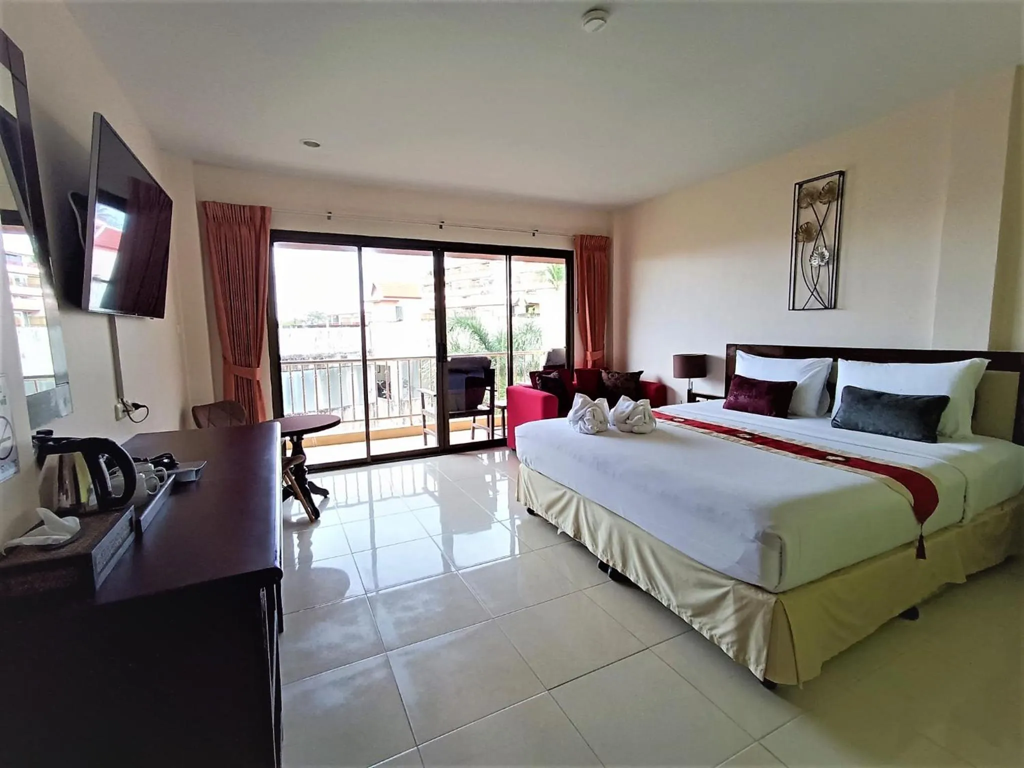 Living room, Bed in Seven Seas Hotel Patong Beach