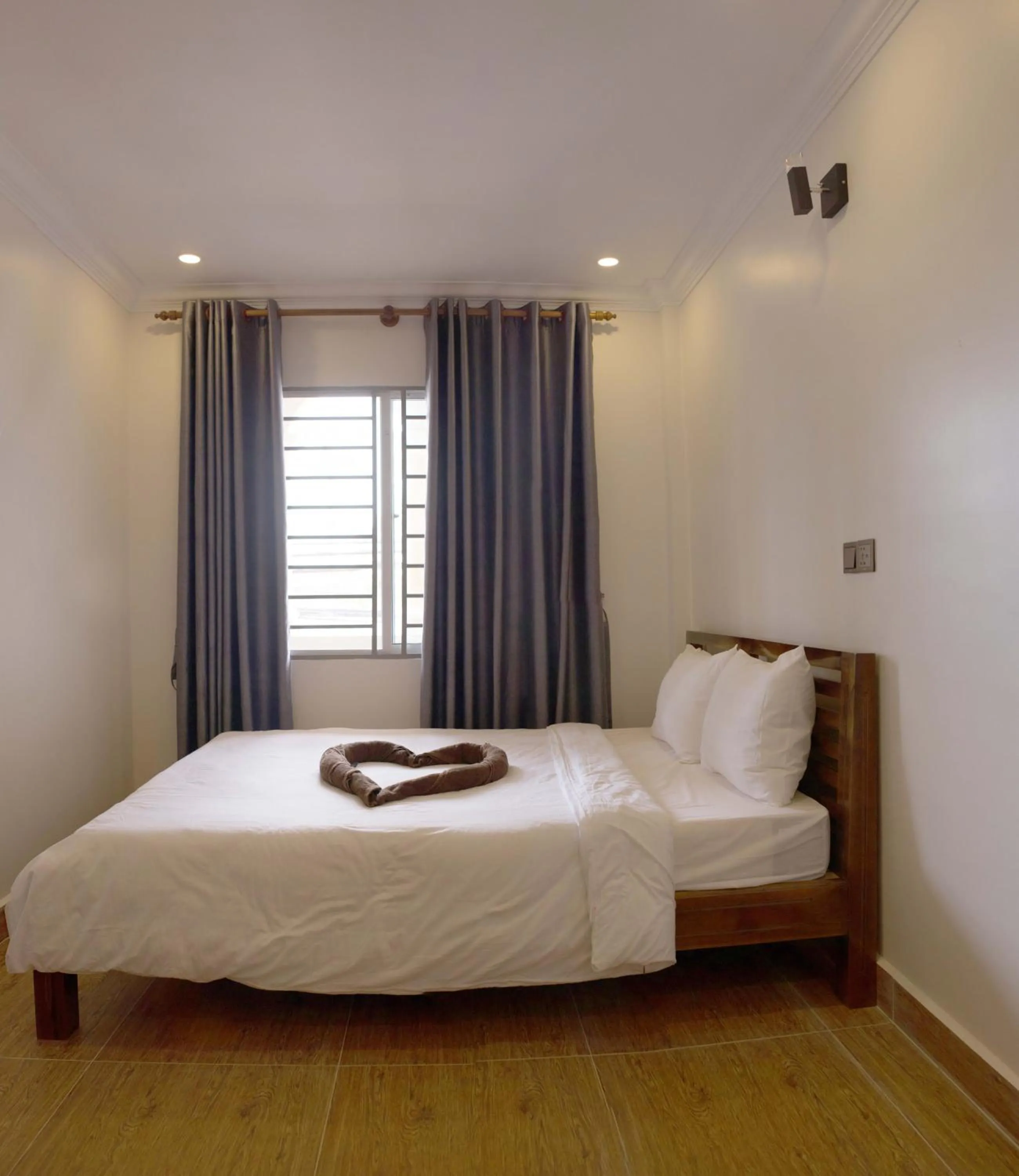 Bed in TWIN HOME Guesthouse