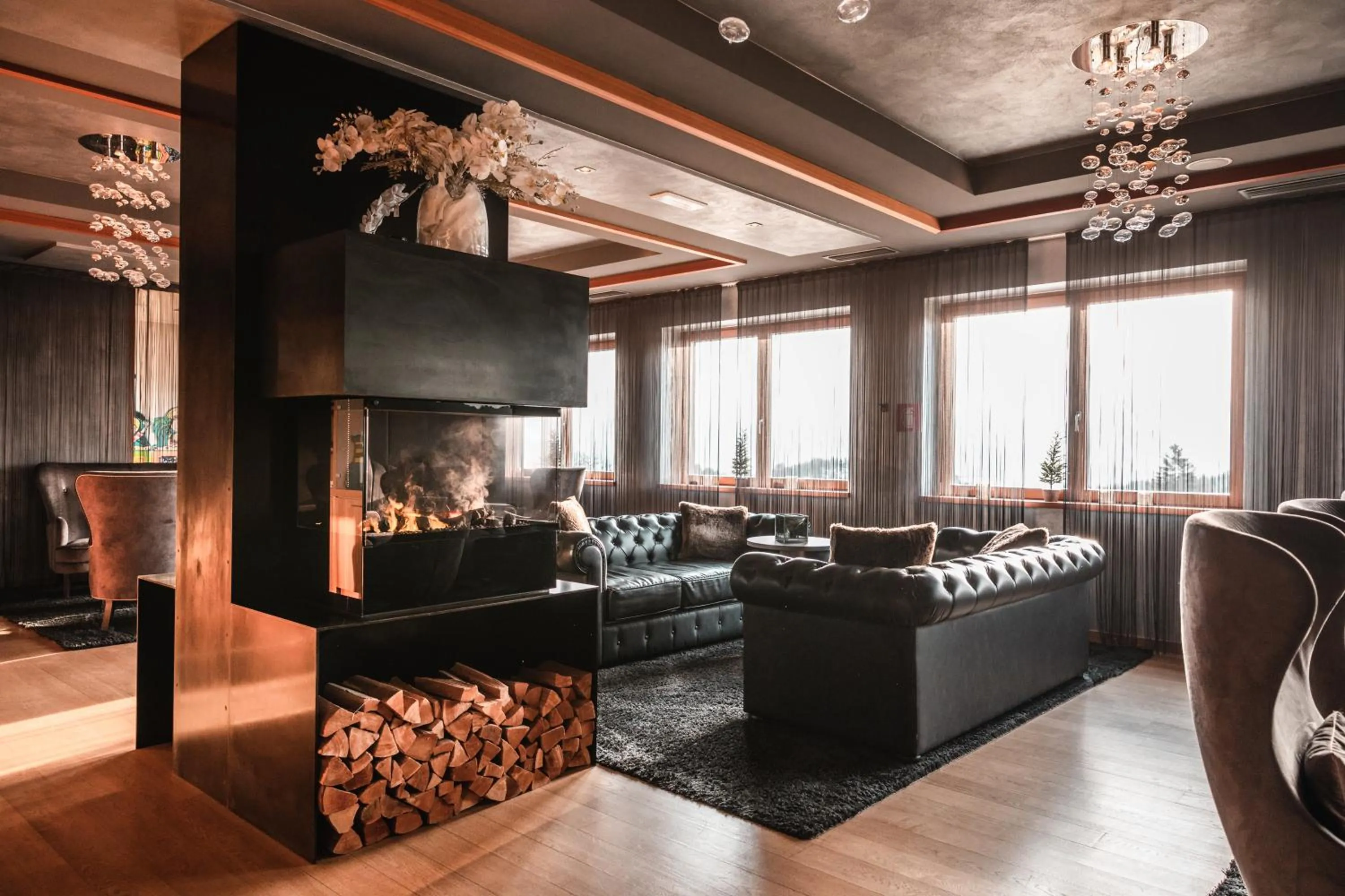 Communal lounge/ TV room in SOLEA DOLOMITI Boutique Hotel