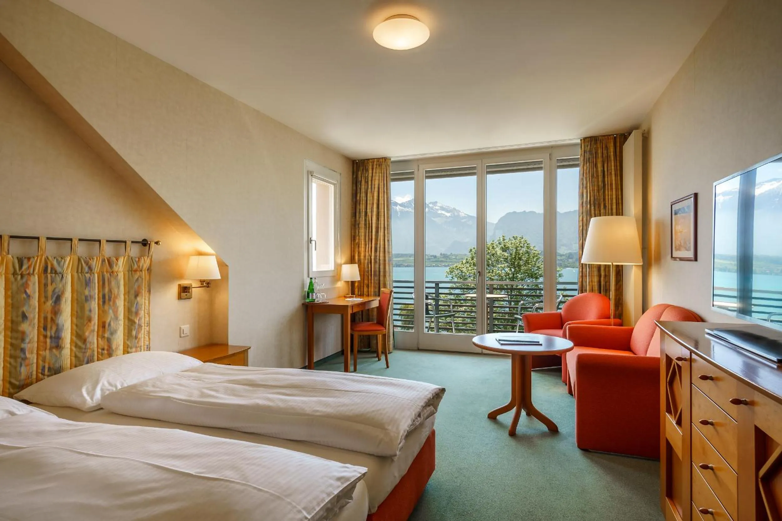 Photo of the whole room, Bed in Schönbühl Hotel & Restaurant Lake Thun