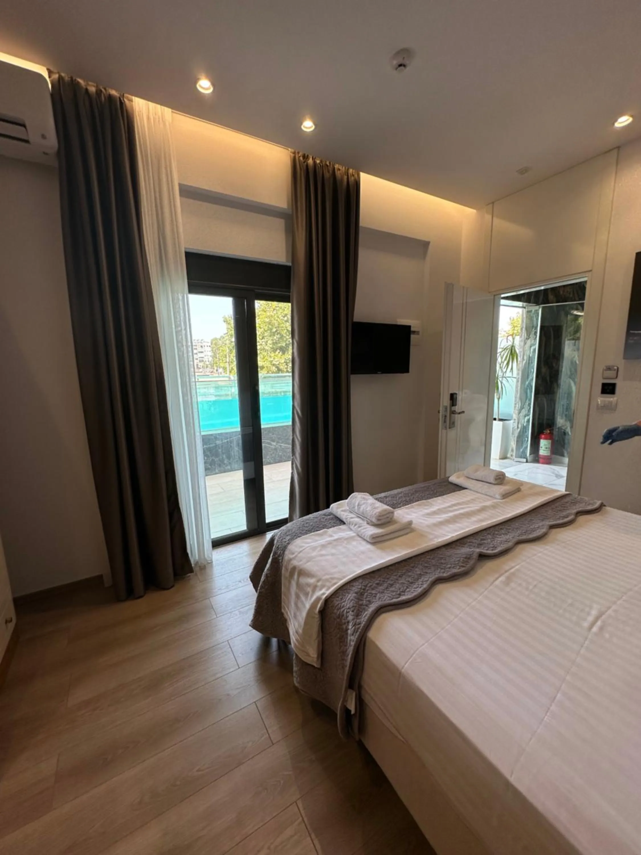 Bed in Ilio Boutique Hotel