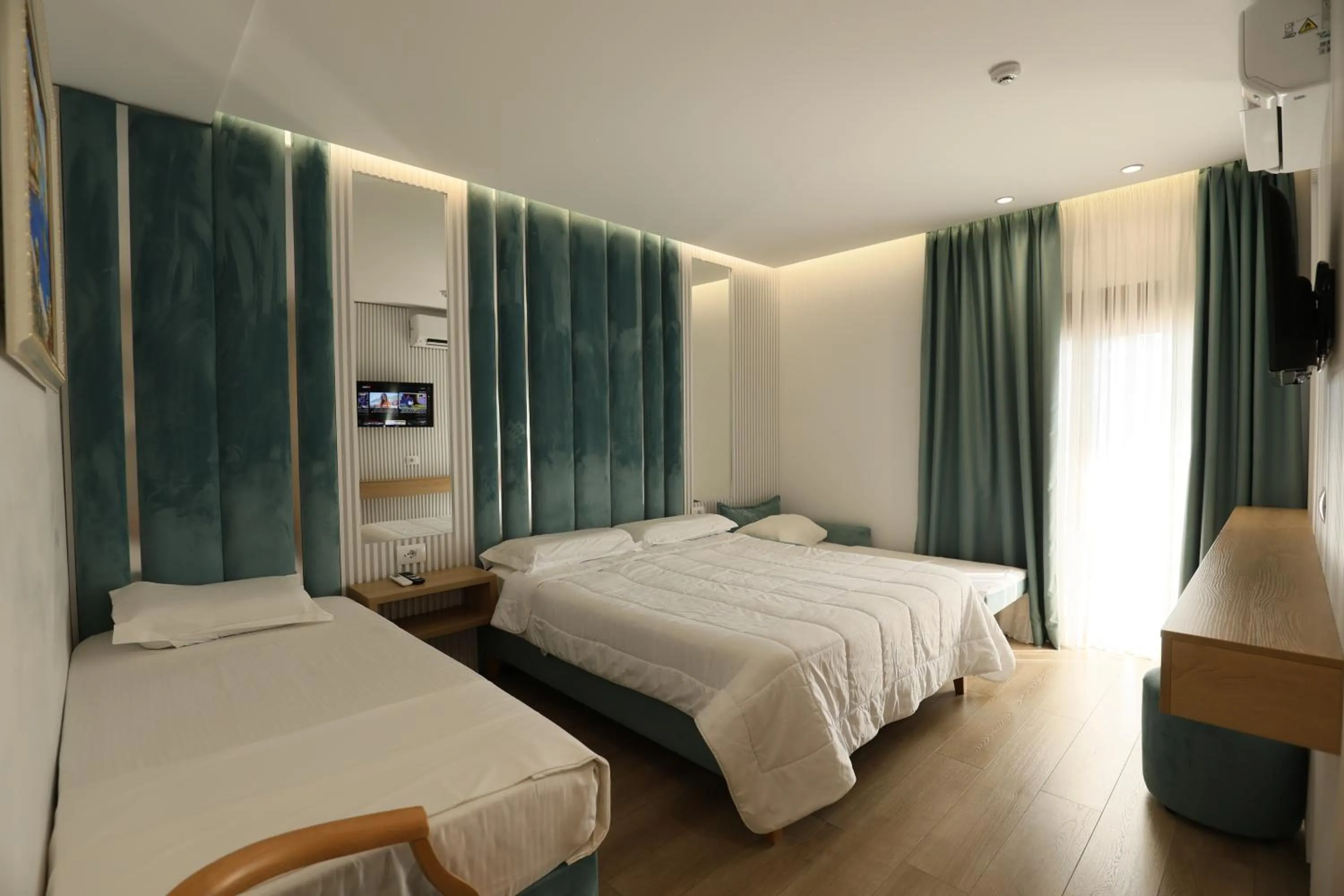 Bed in Ilio Boutique Hotel