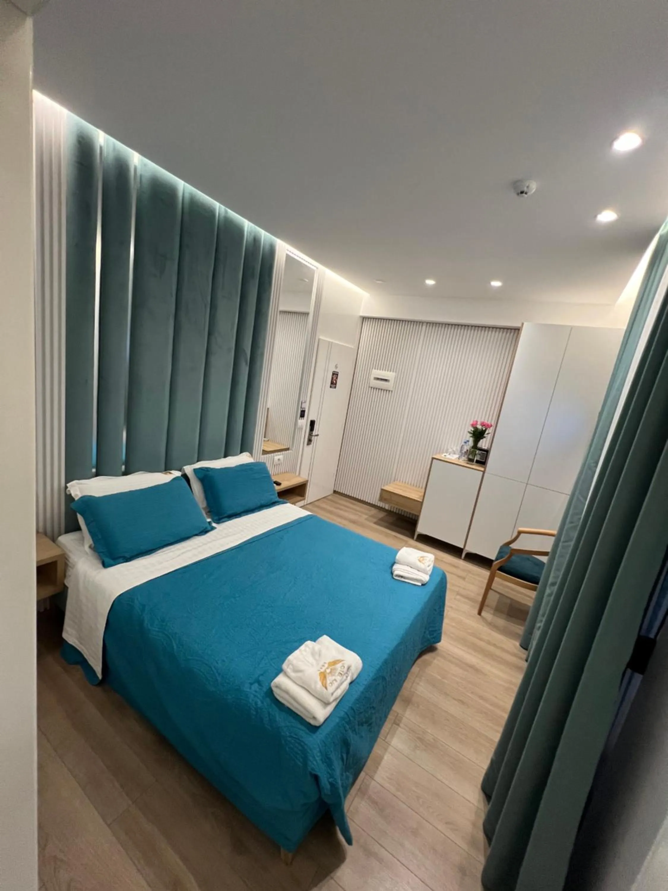 Bed in Ilio Boutique Hotel