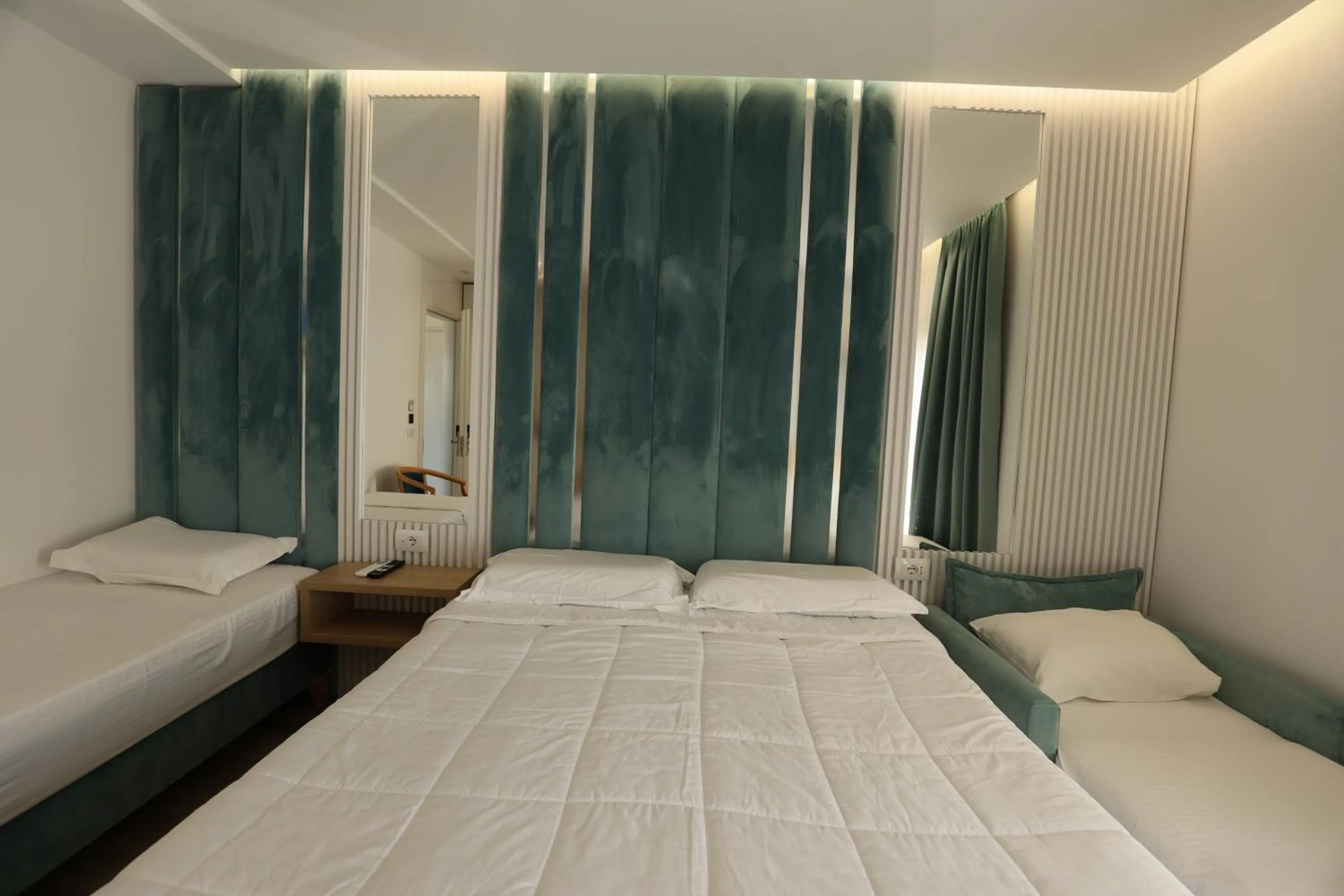 Bed in Ilio Boutique Hotel