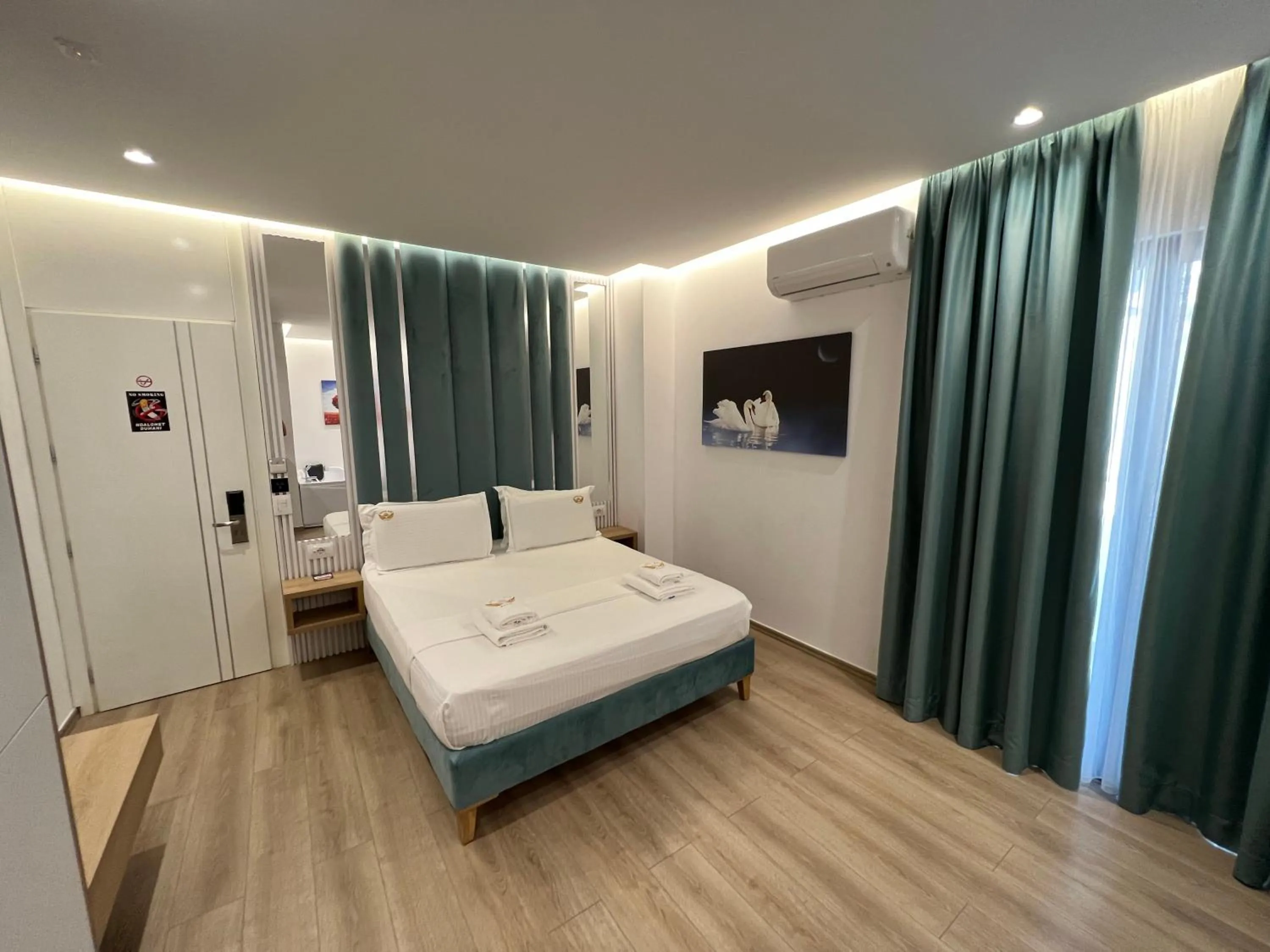 Bed in Ilio Boutique Hotel