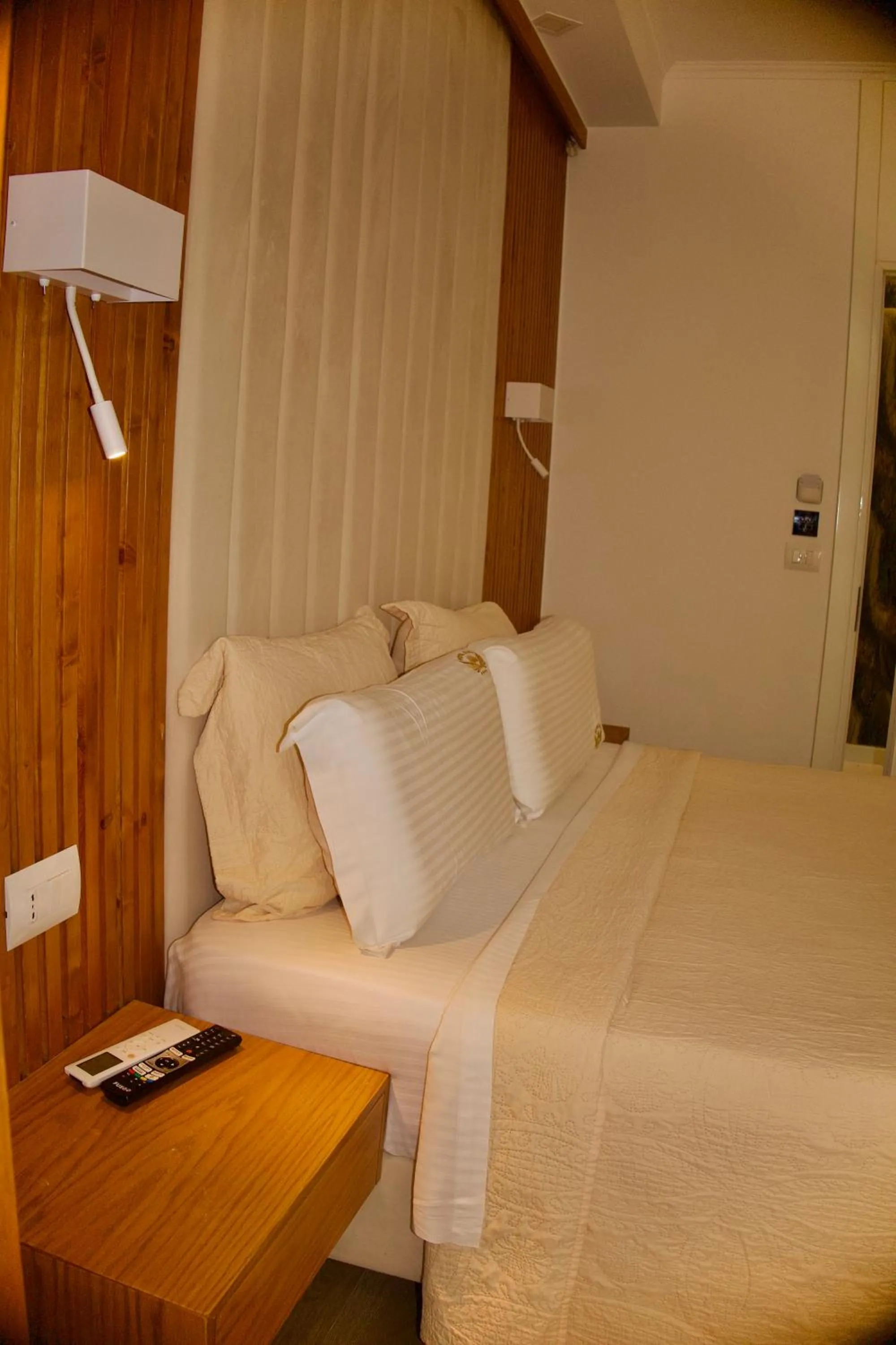 Bed in Ilio Boutique Hotel