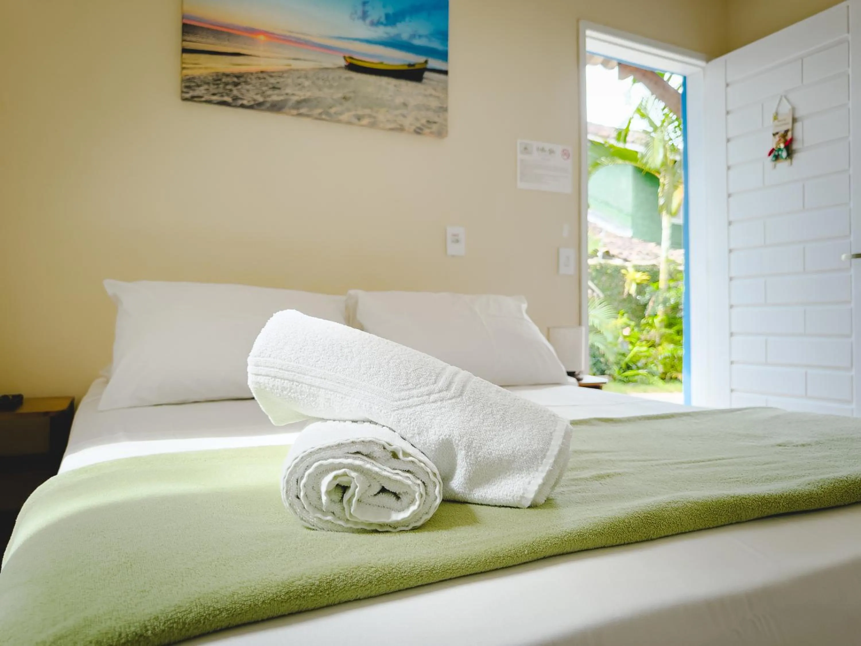 Bed in Pousada Villa Blu Maresias