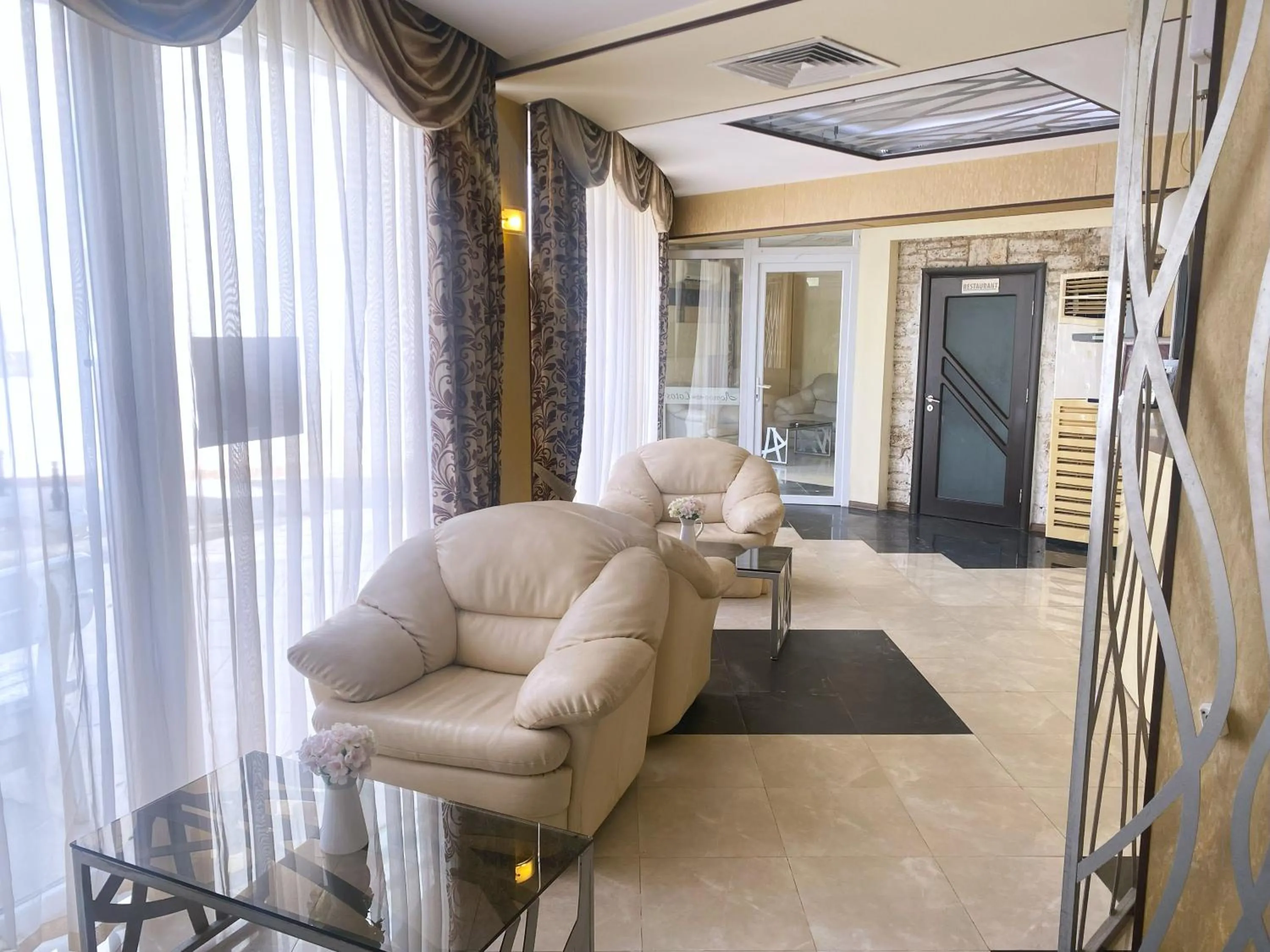 Lobby or reception in Lotos Hotel