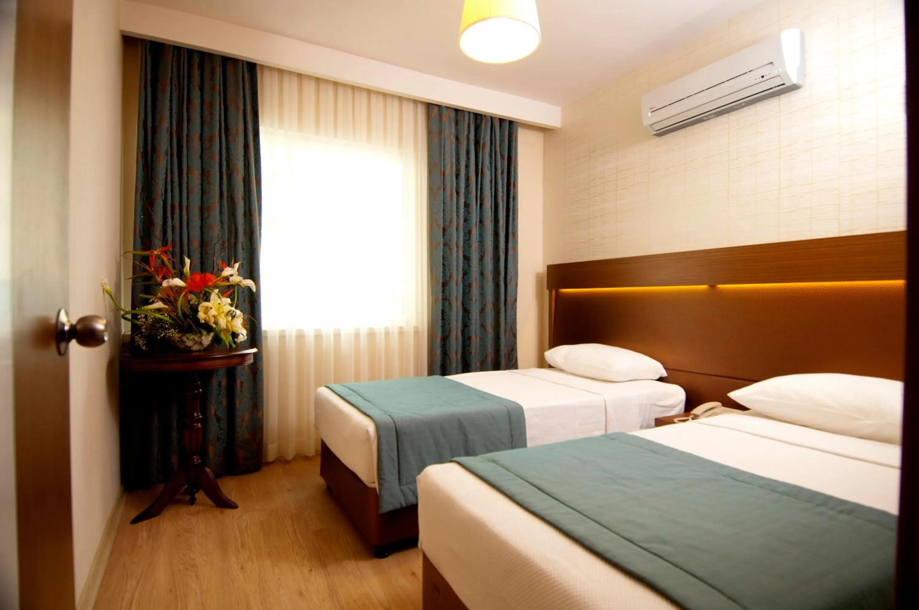 Bed in Supreme Hotel