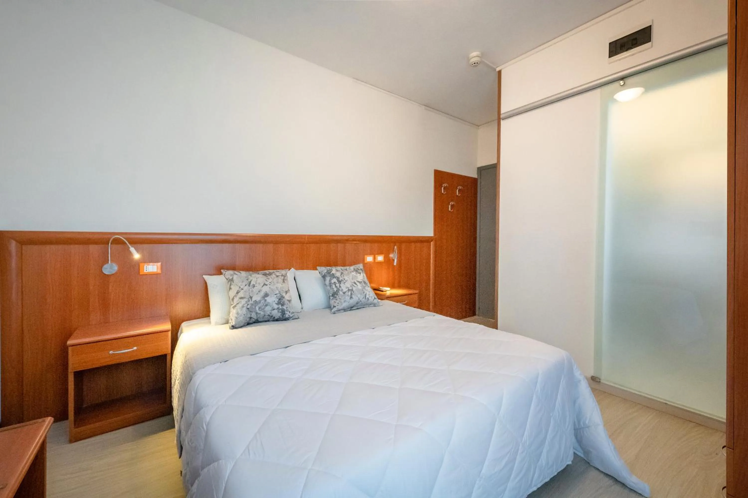 Bed in Hotel Portofino