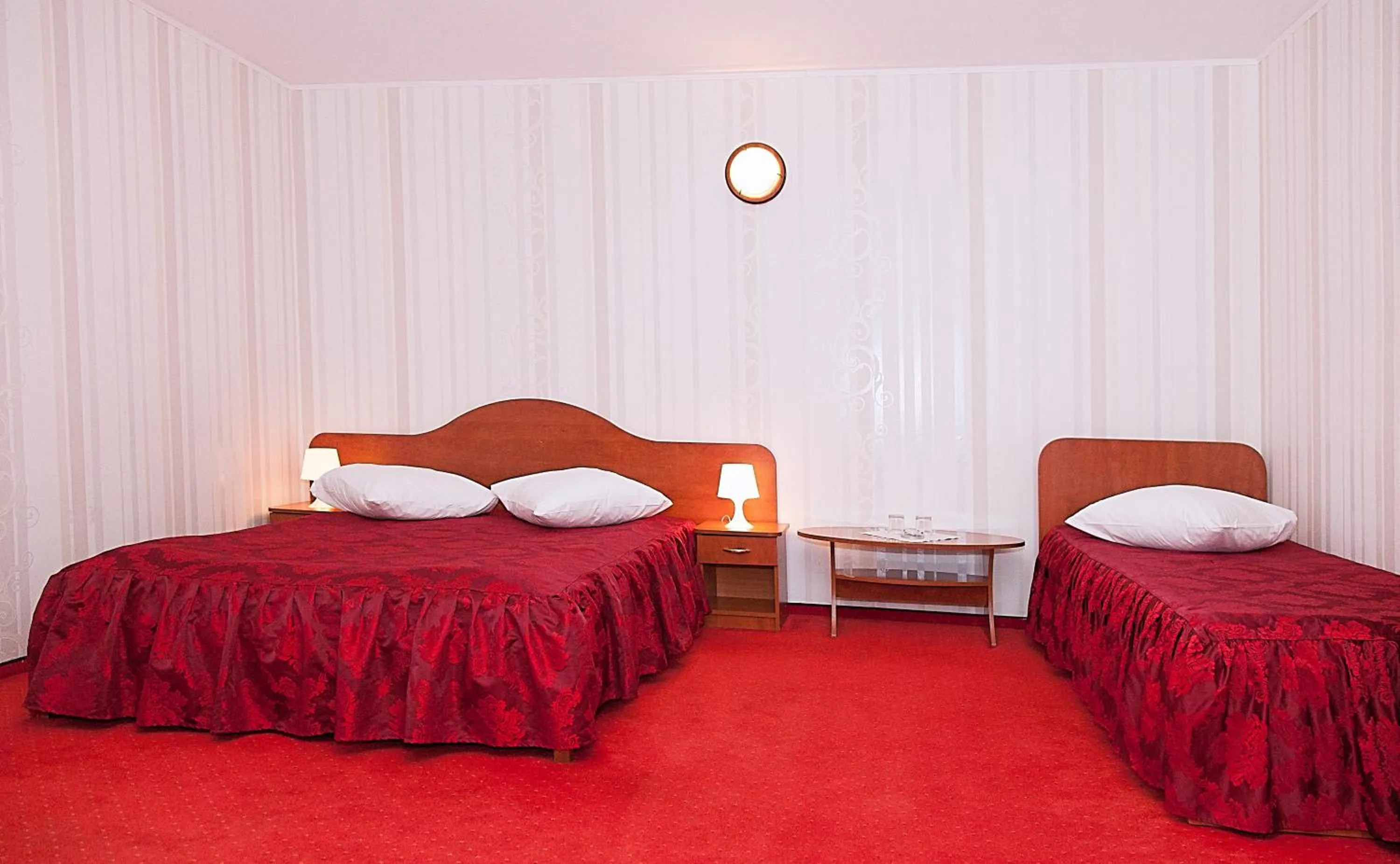 Living room, Bed in Hotel Rusu