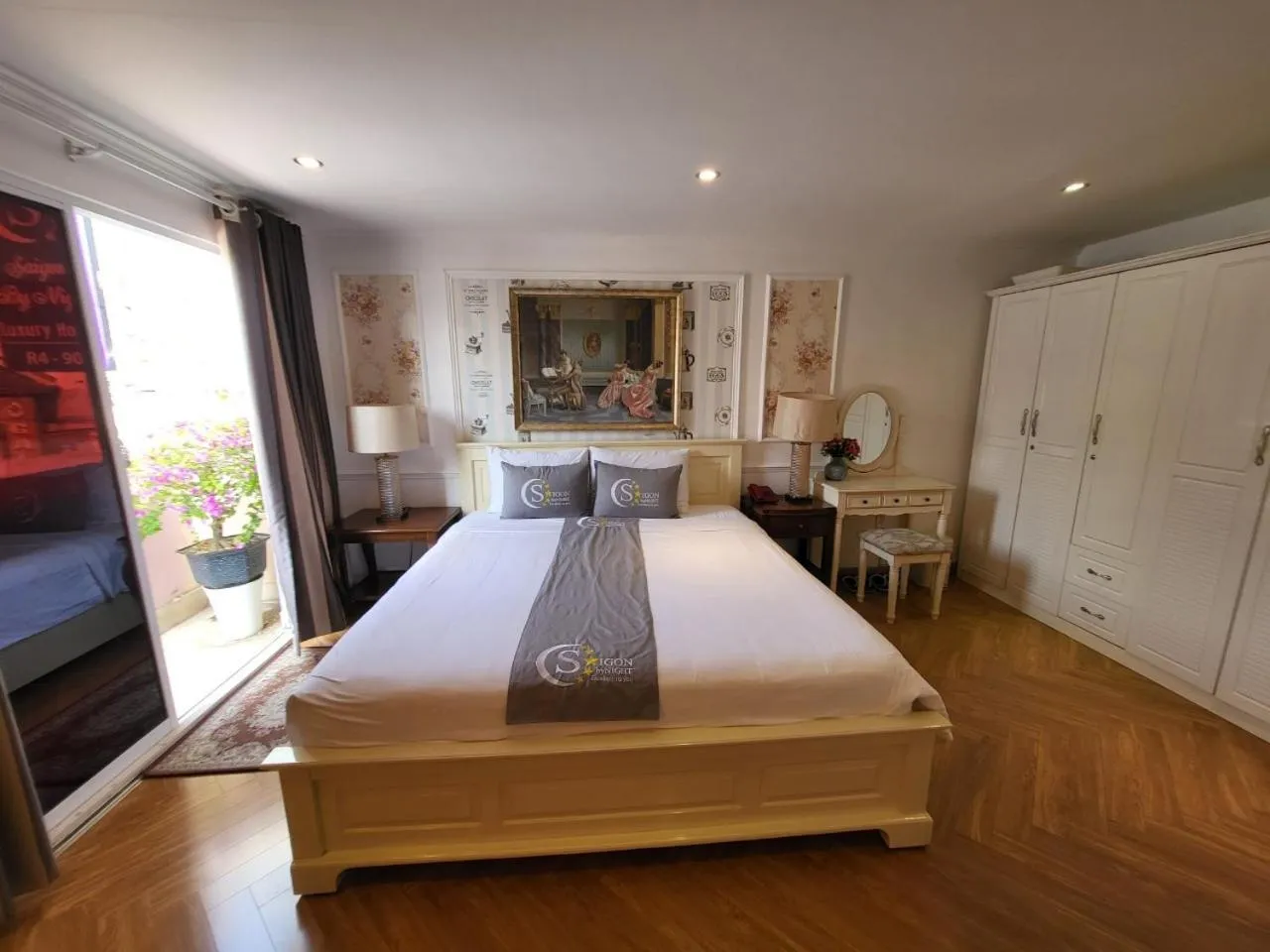 Bed in Saigon By Night Luxury Hotel