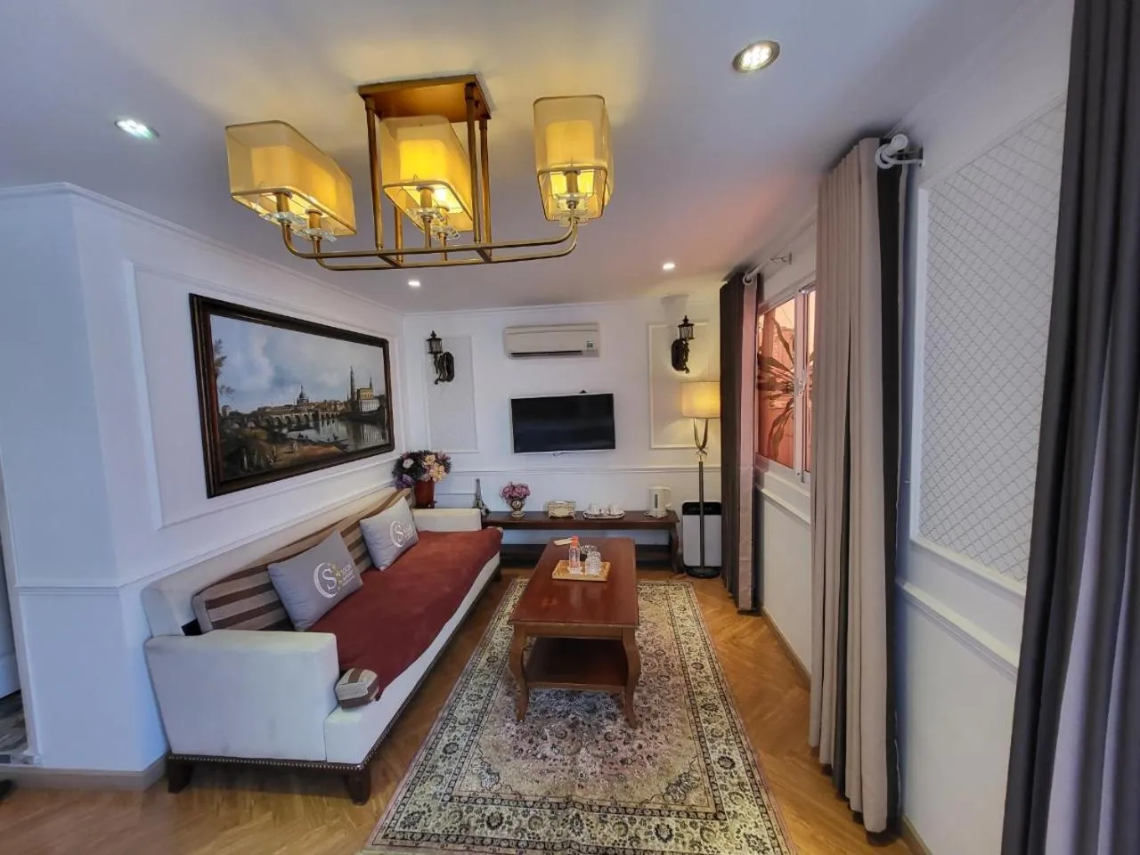 Bed in Saigon By Night Luxury Hotel