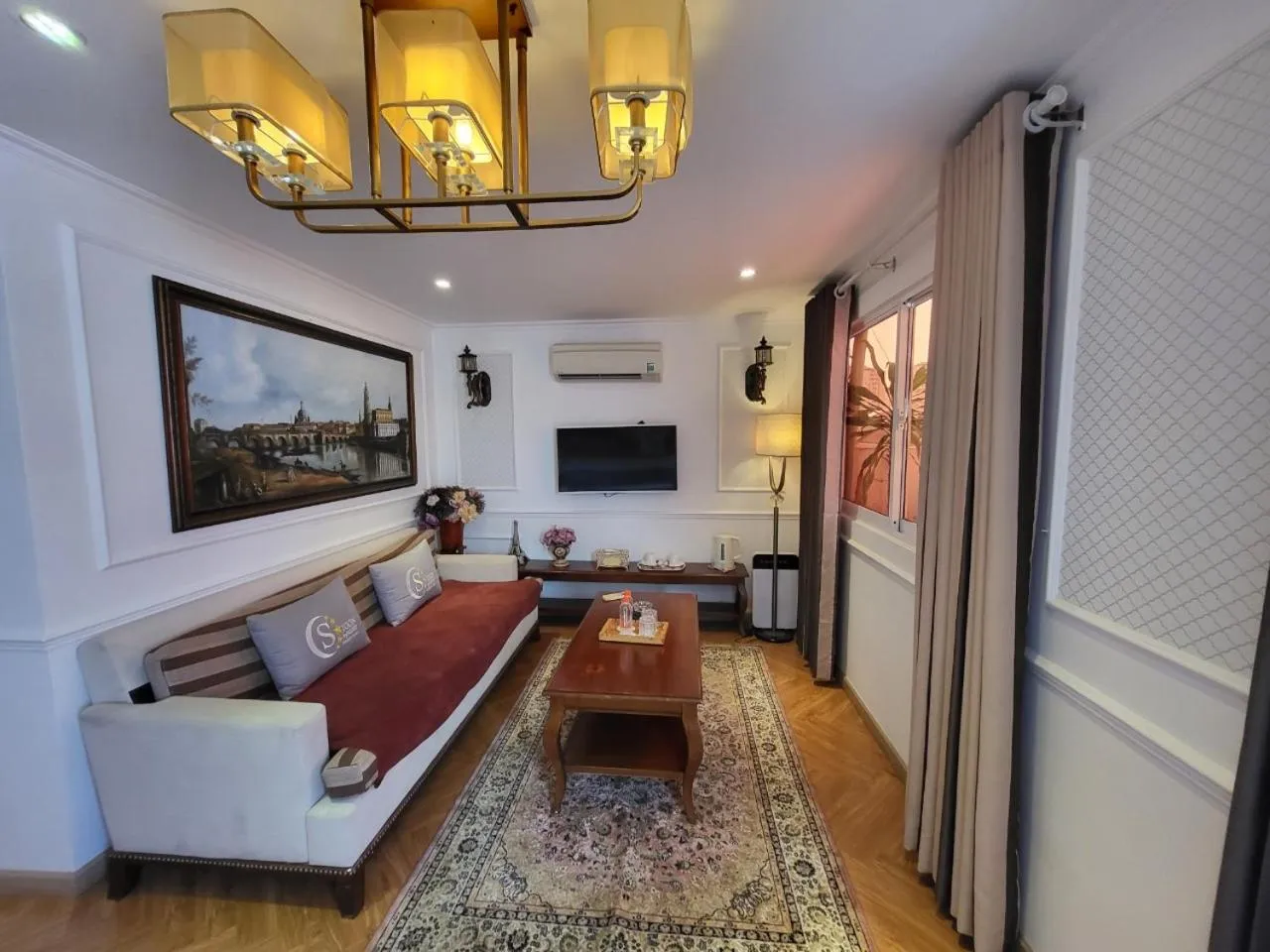 Bed in Saigon By Night Luxury Hotel