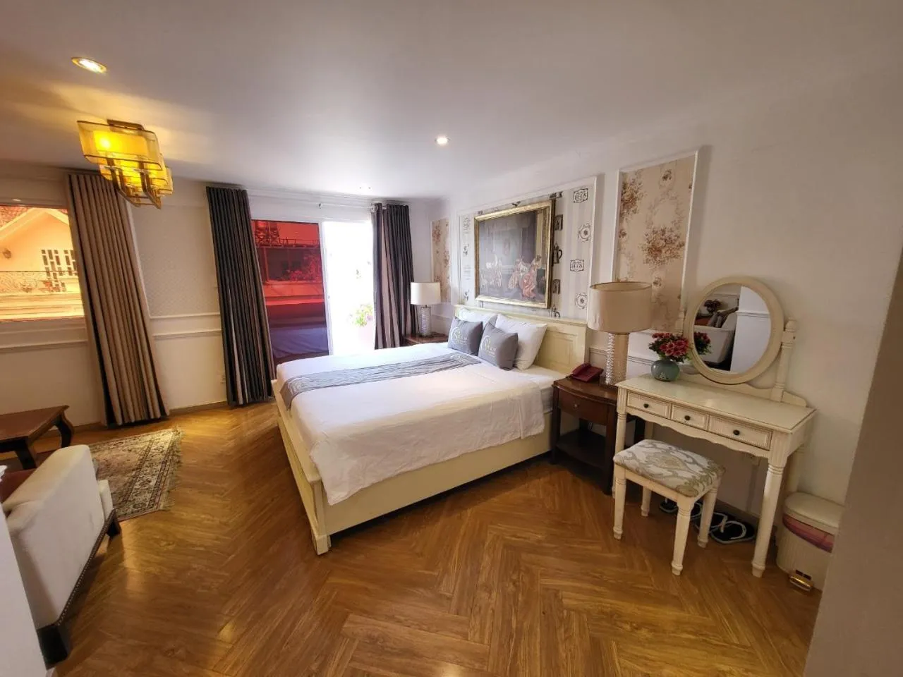 Bed in Saigon By Night Luxury Hotel