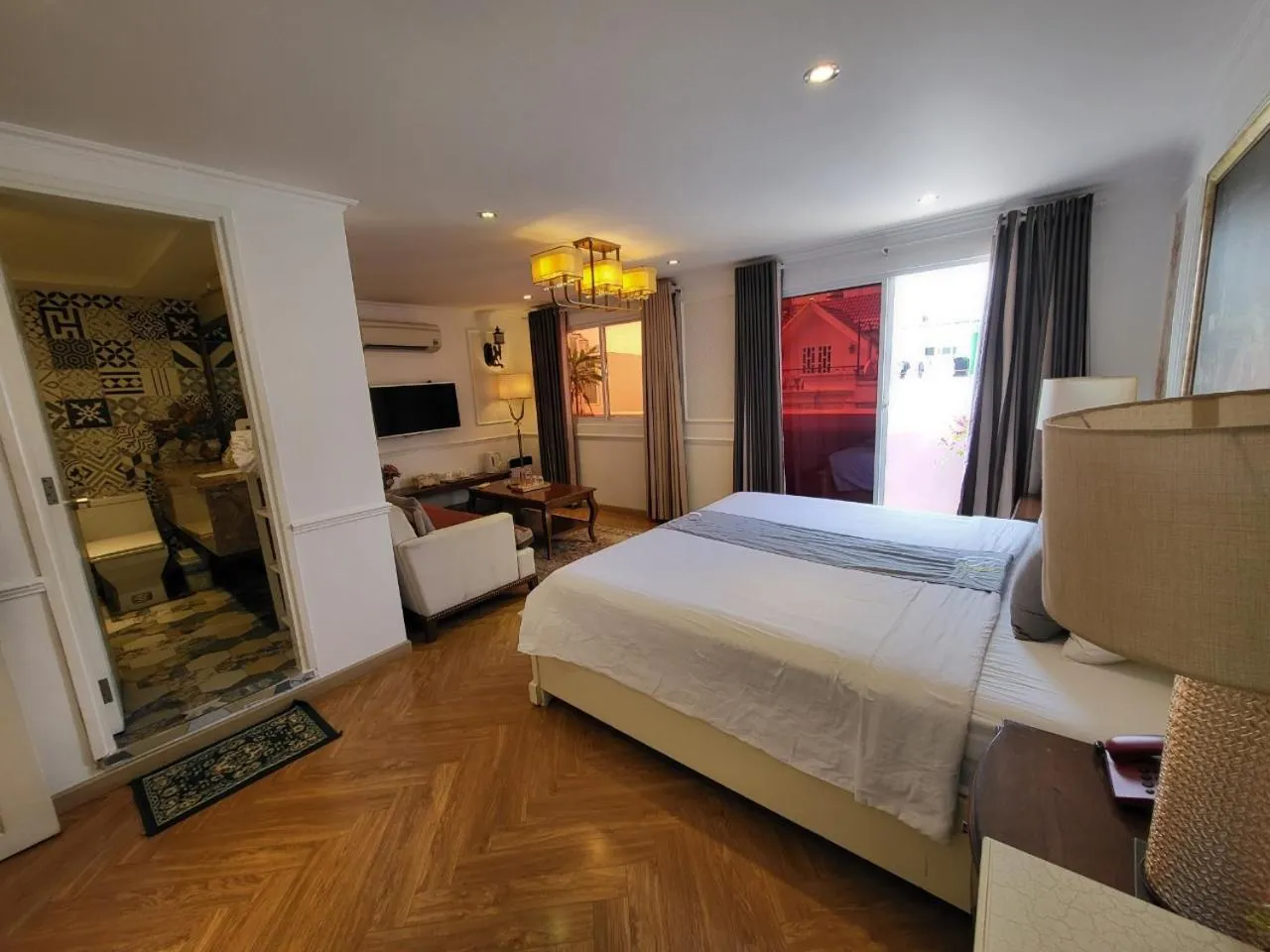 Bed in Saigon By Night Luxury Hotel