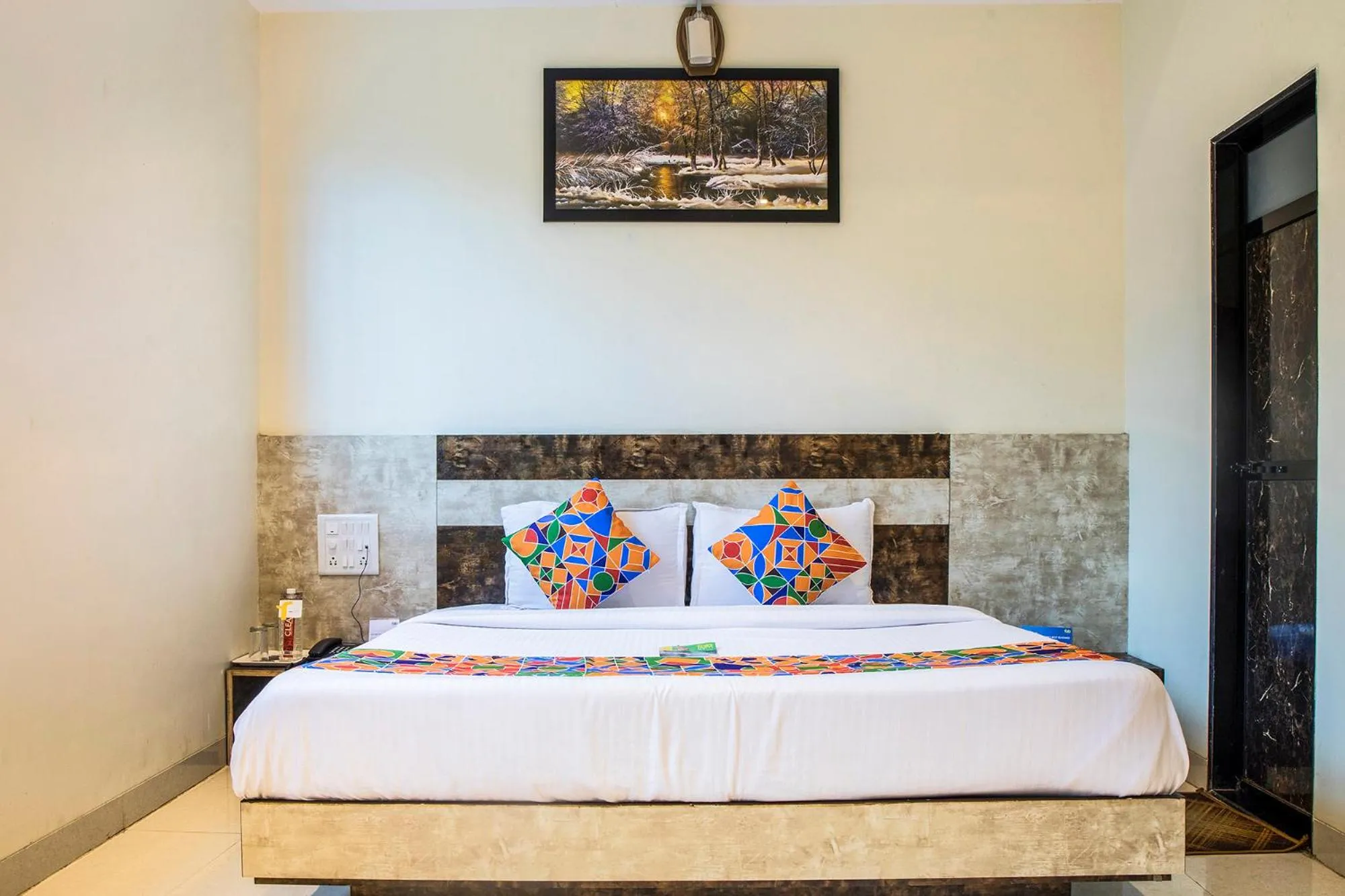 Bed in FabHotel Embassy Grand