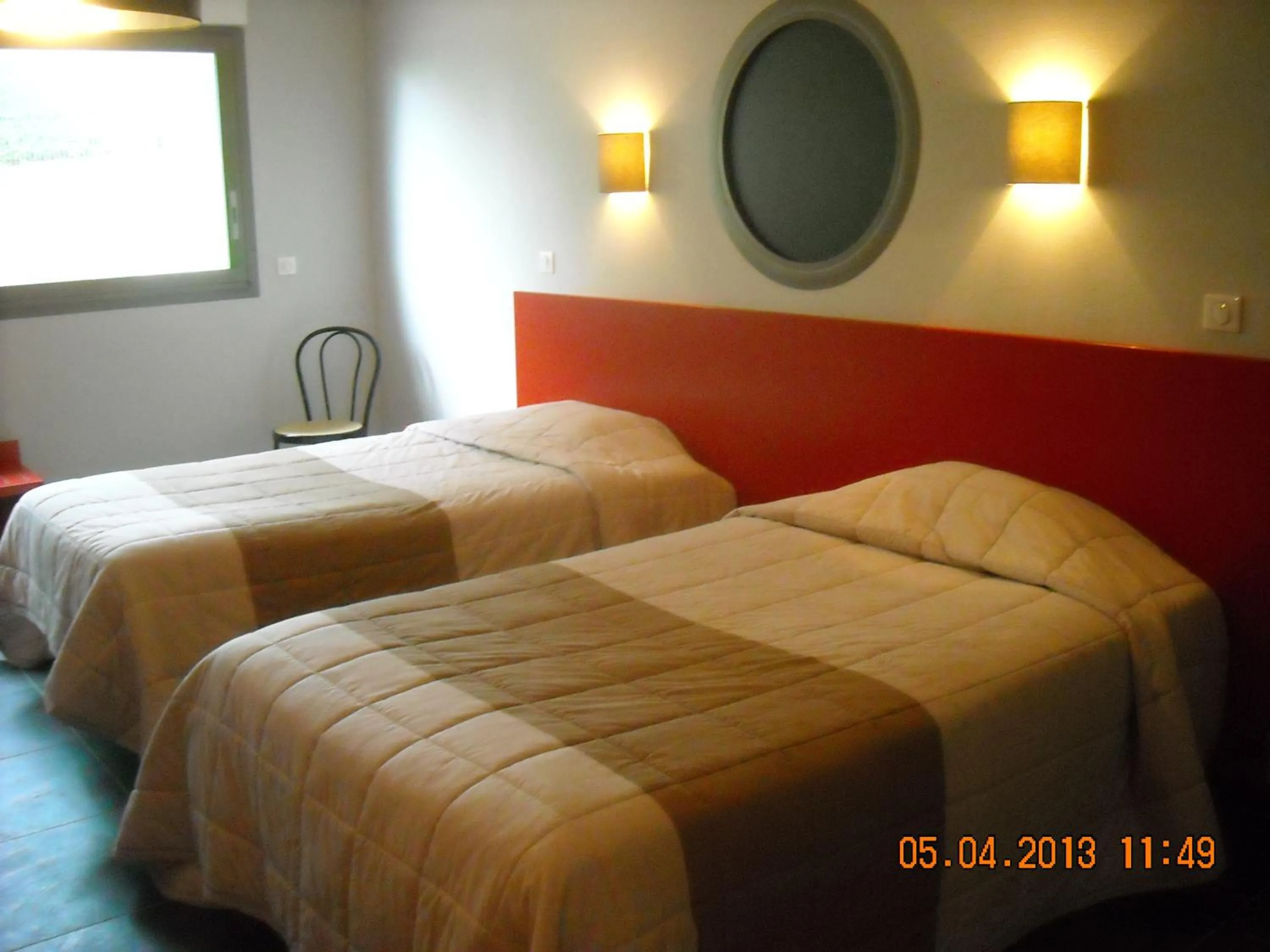 Bed in Logis Hotels - Hôtel et Restaurant Le Relais des Garrigues