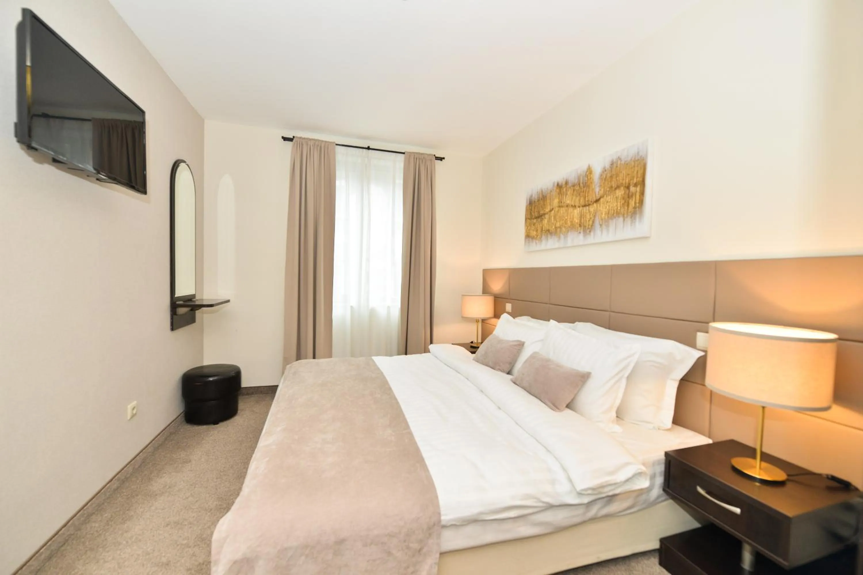 Bed in Art Plaza Hotel