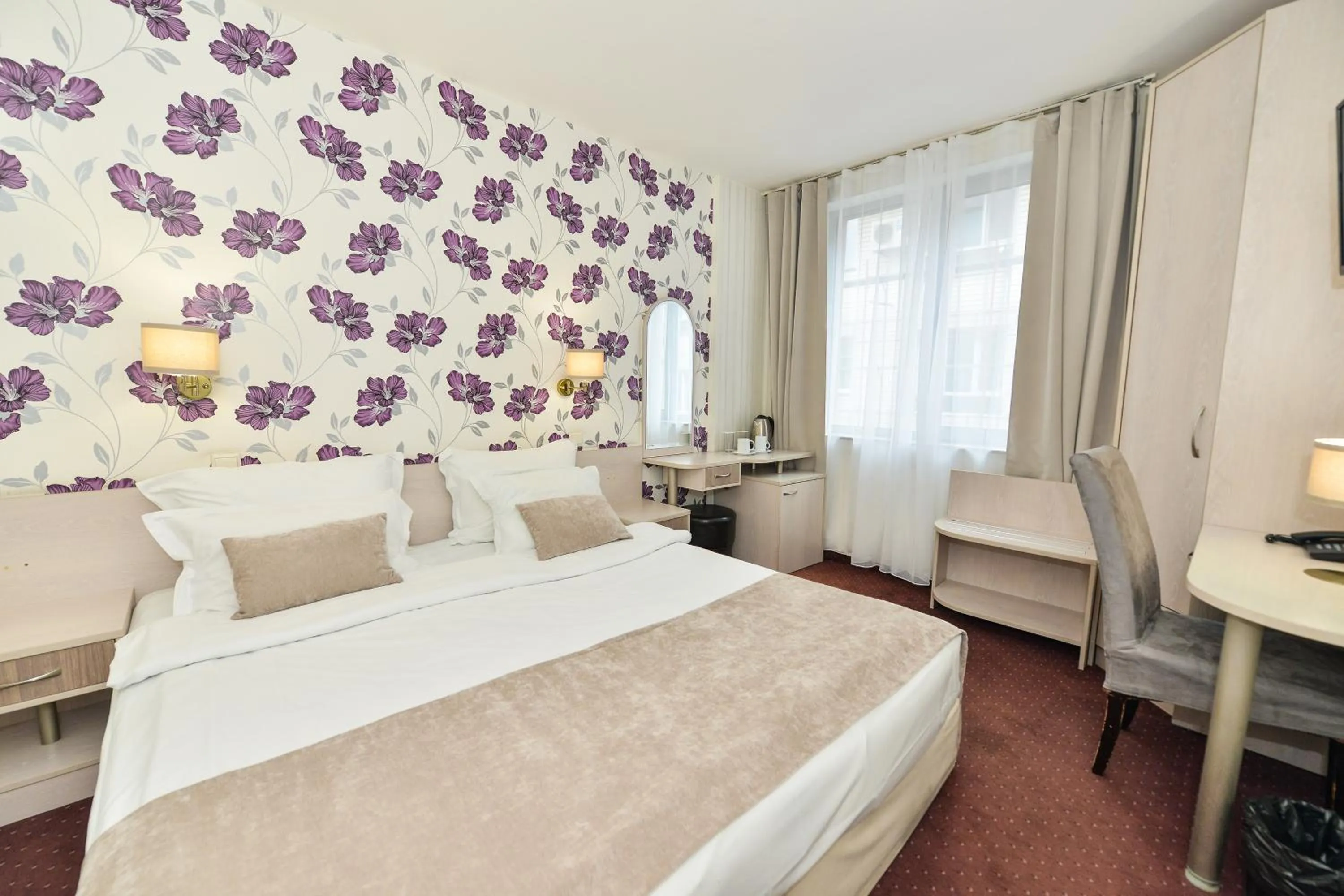 Bed in Art Plaza Hotel