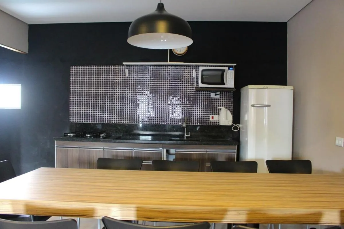 Kitchen or kitchenette in Don Marcos Hotel com Restaurante e Pizzaria