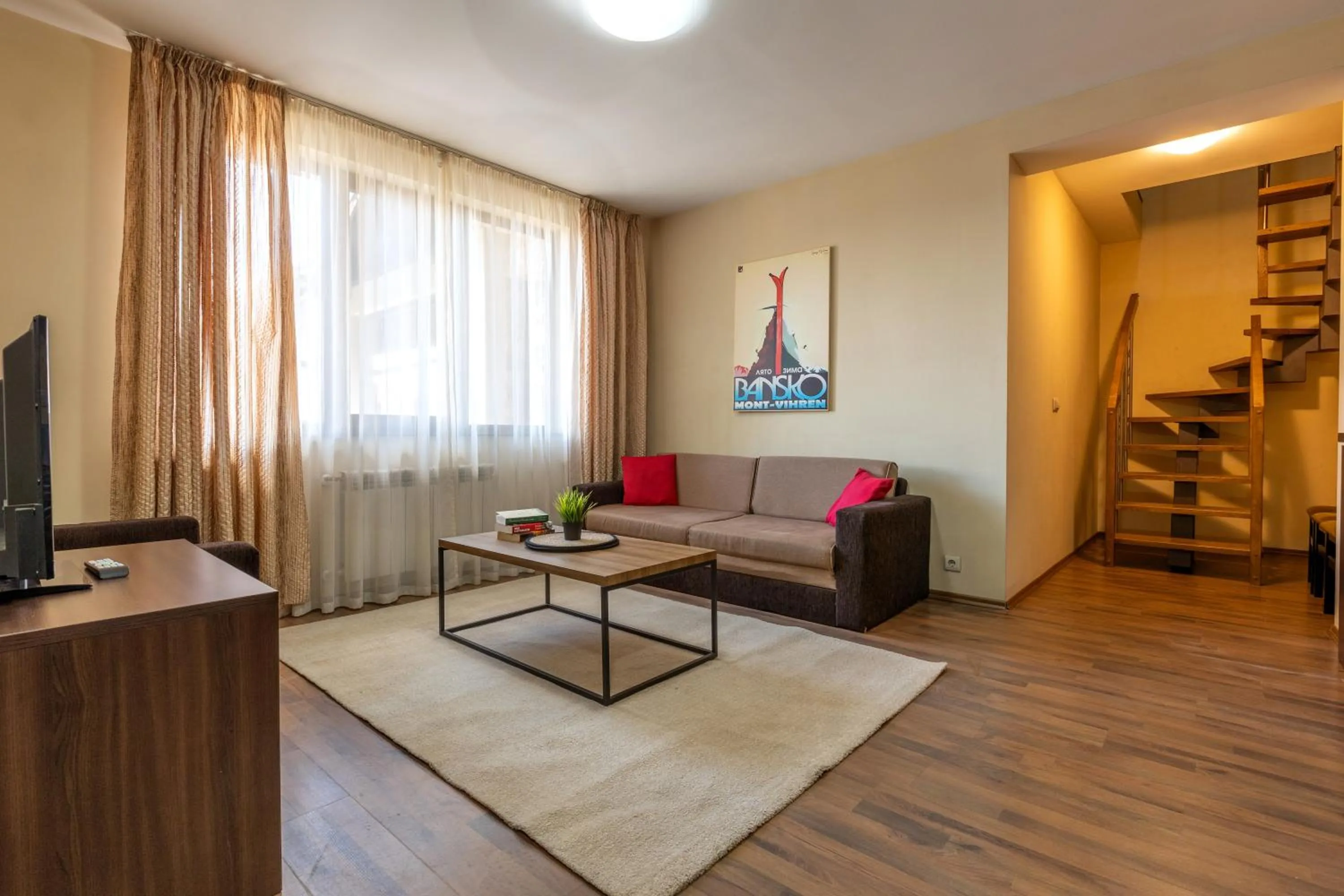 Communal lounge/ TV room in Apart Hotel Dream