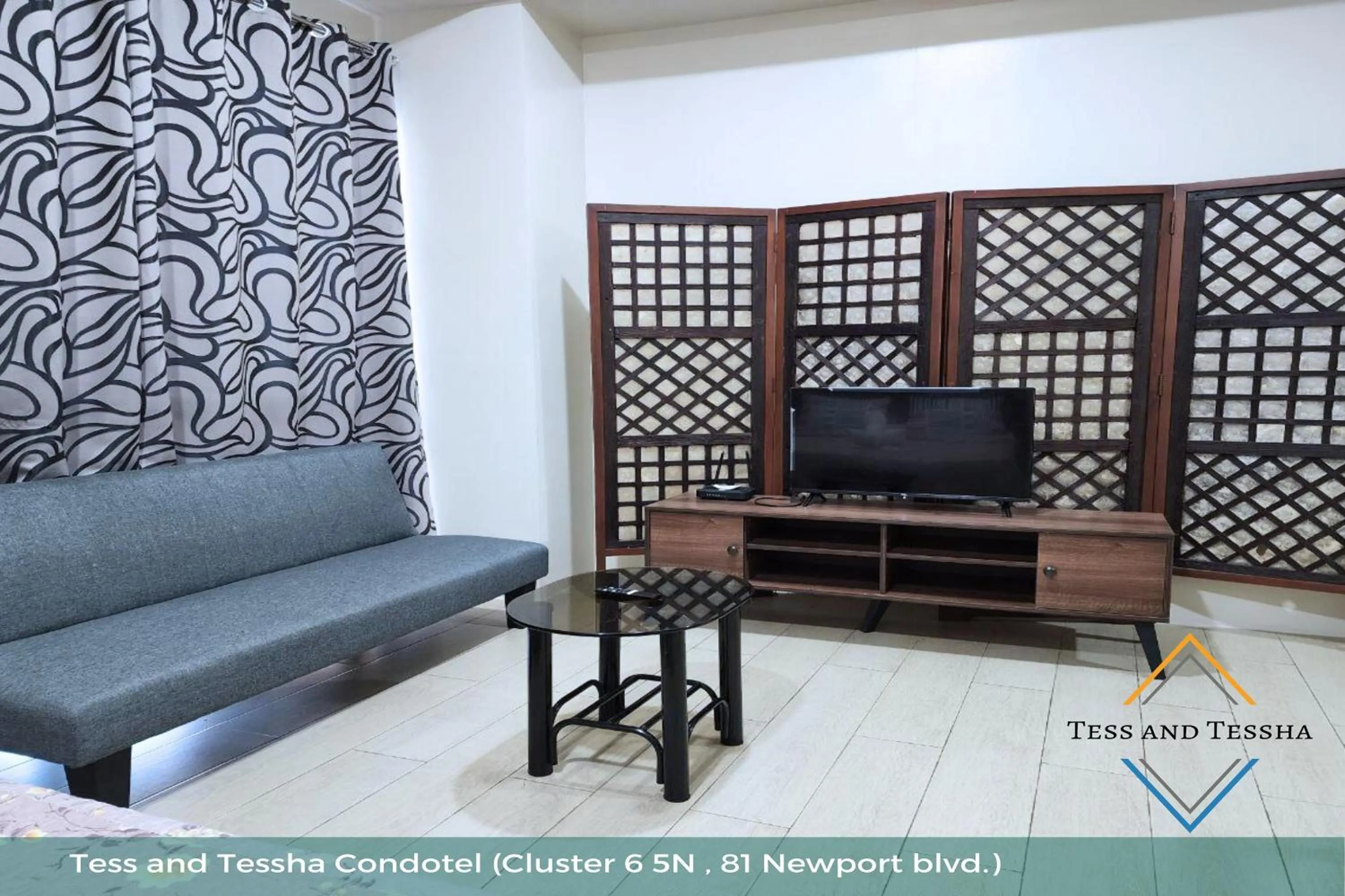 Living room in Tess and Tessha Condotel near T3 Airport
