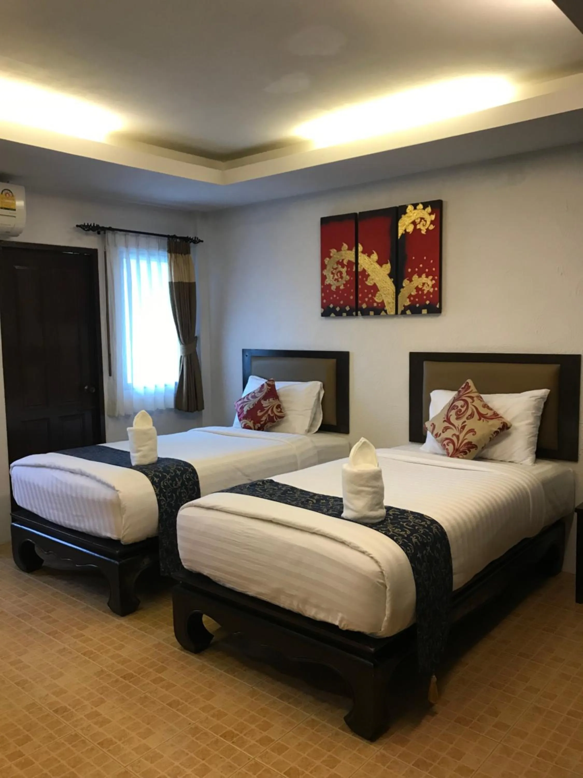 Bed in Arina Boutique Residence