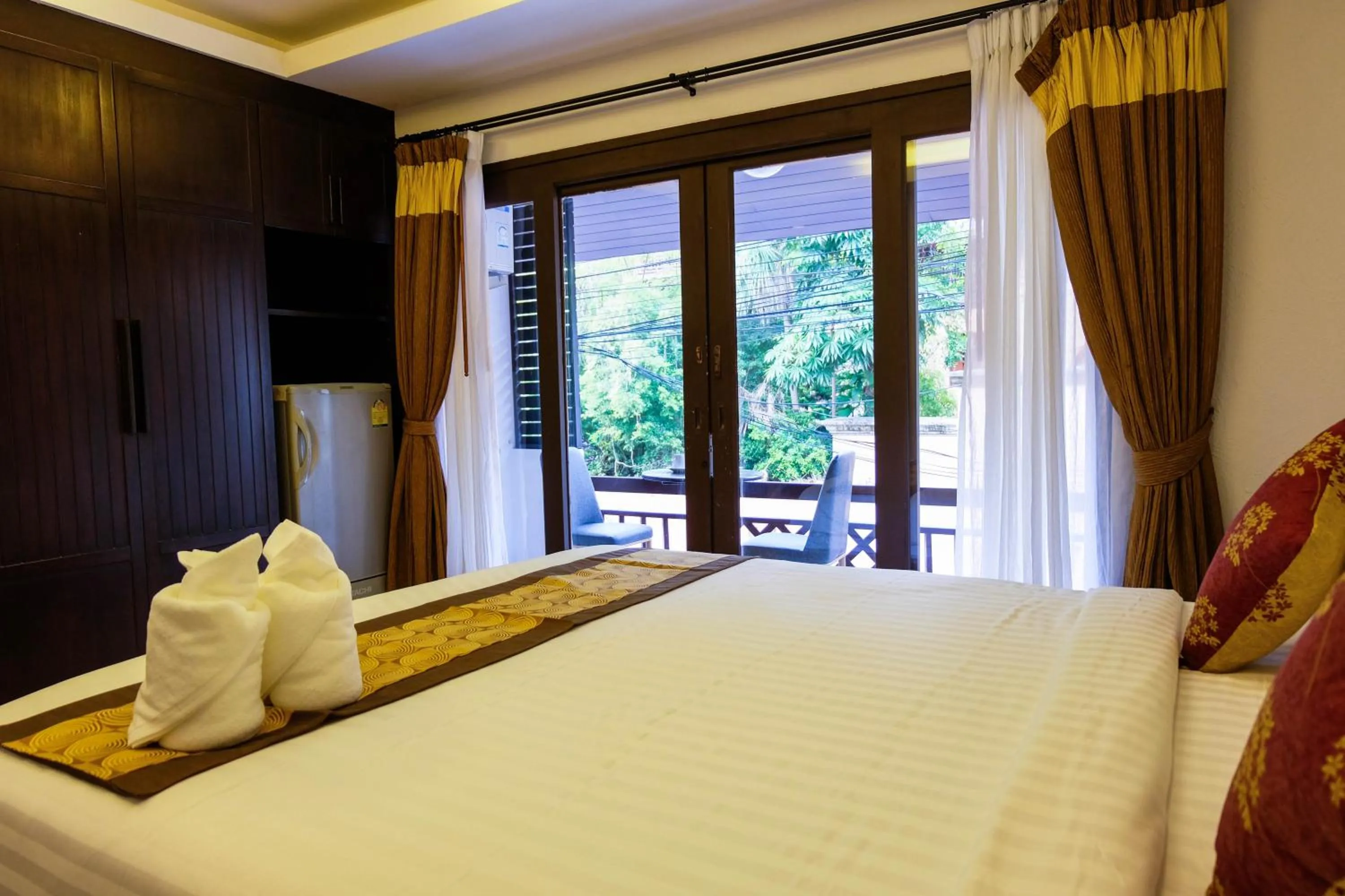 Bed in Arina Boutique Residence